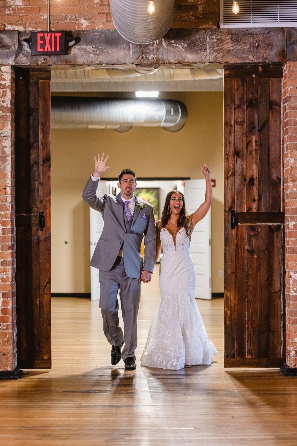 Bride and groom, enter Trailside wedding reception