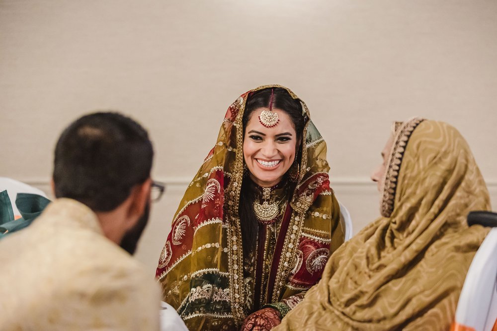 Muslim bride laughs