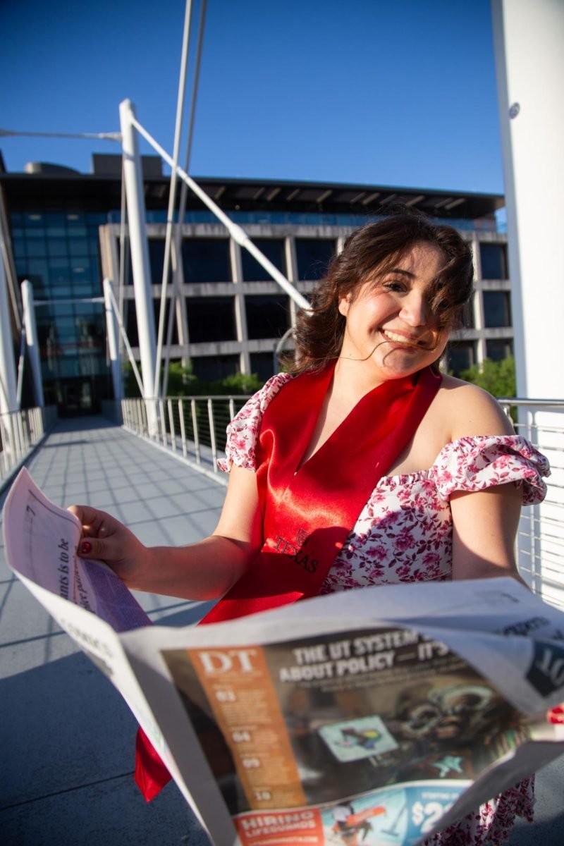 Ren Leija poses for a portrait on the Moody Bridge on April 24, 2025.