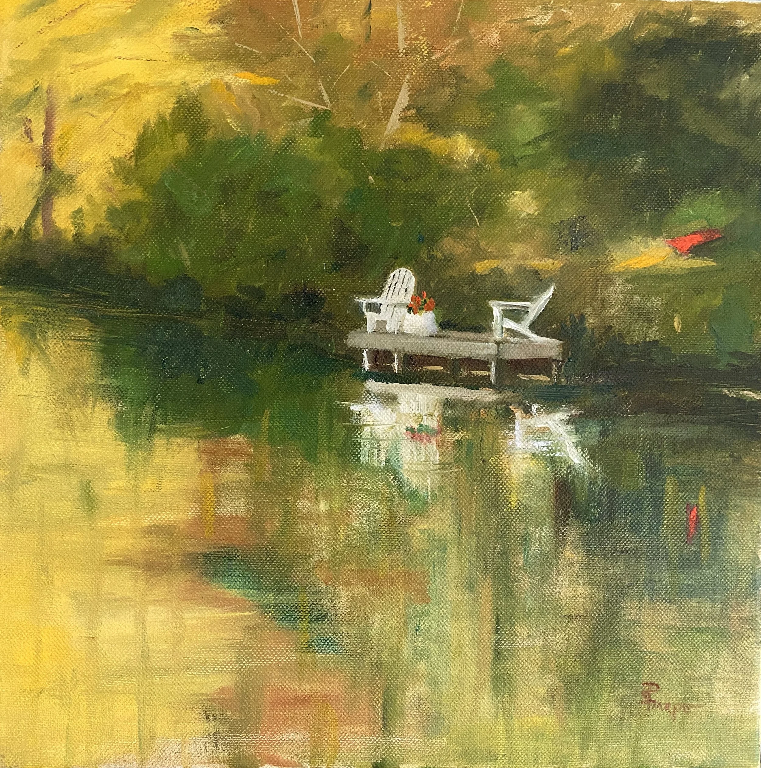An impressionist painting of two white chairs and a small table with a bouquet of red flowers on a wooden dock surrounded by lush green trees and their reflections in the calm water.