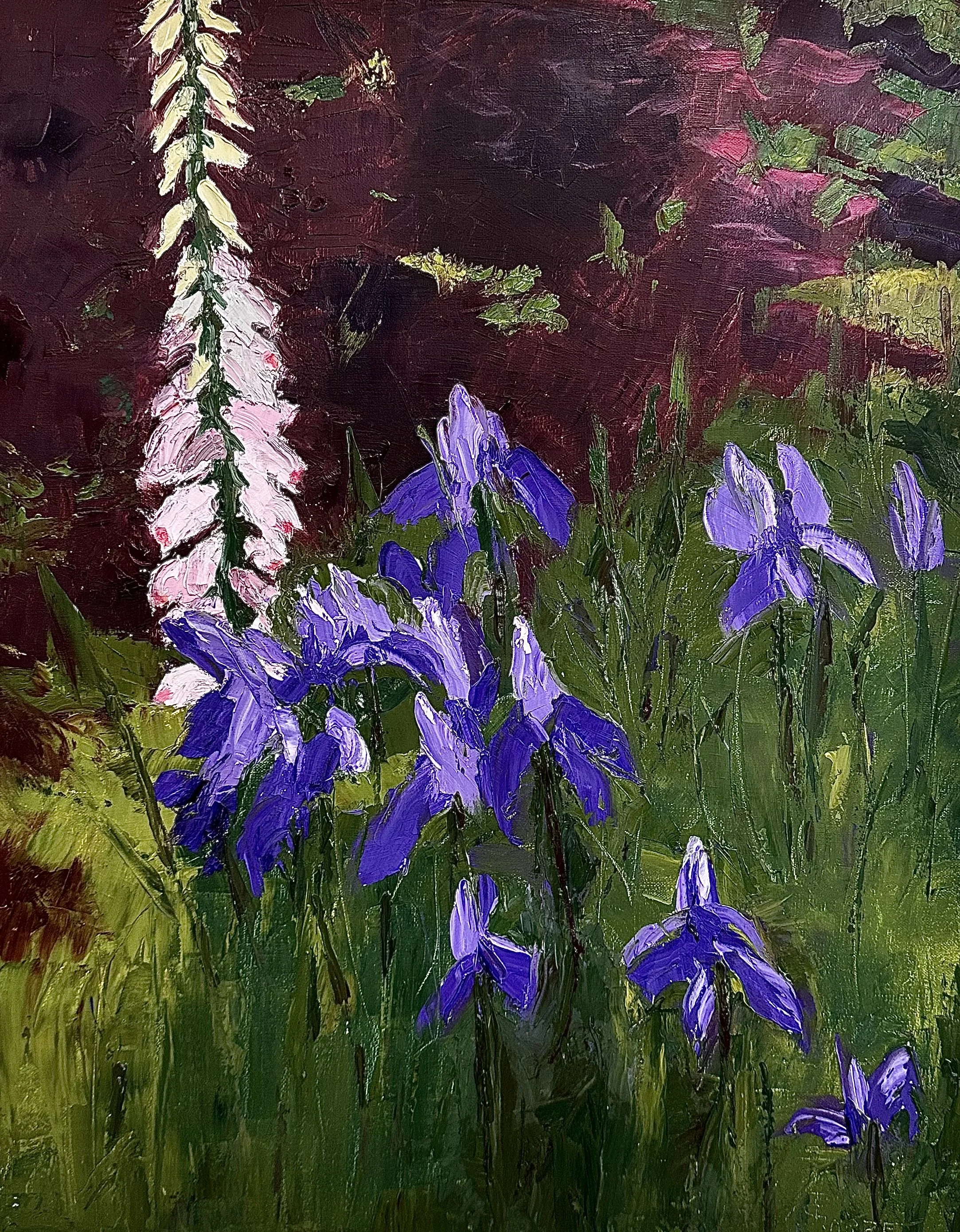 Bold oil painting of a foxglove and some purple irises surrounded by lush green and burgundy shrubs.