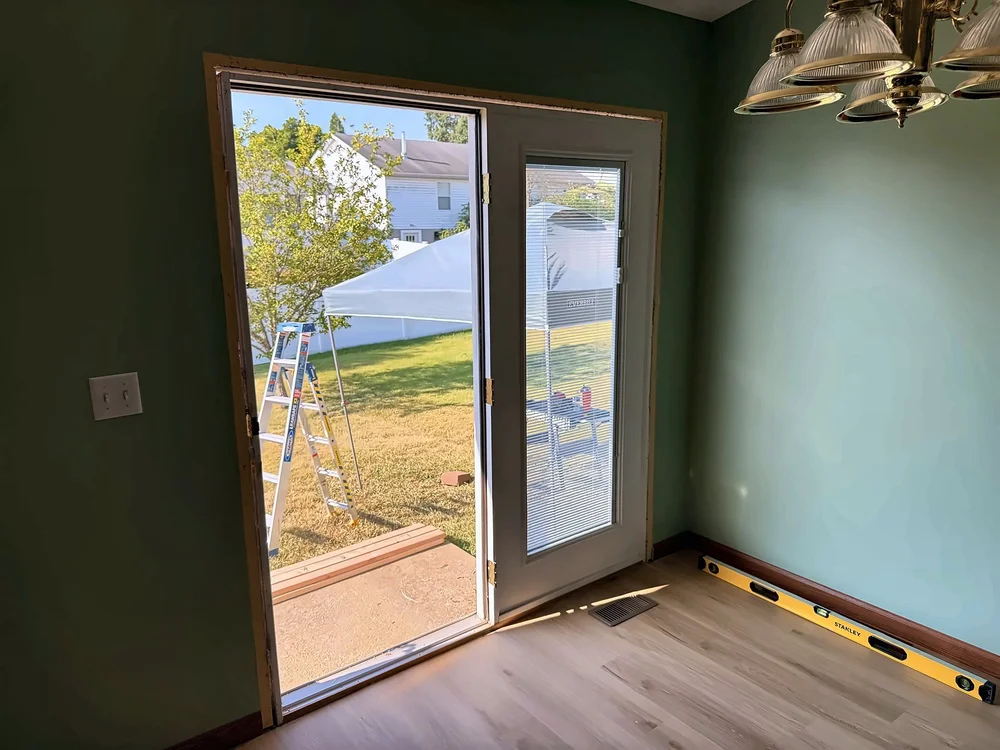 Inside view of the old wide back door opening during the door replacement