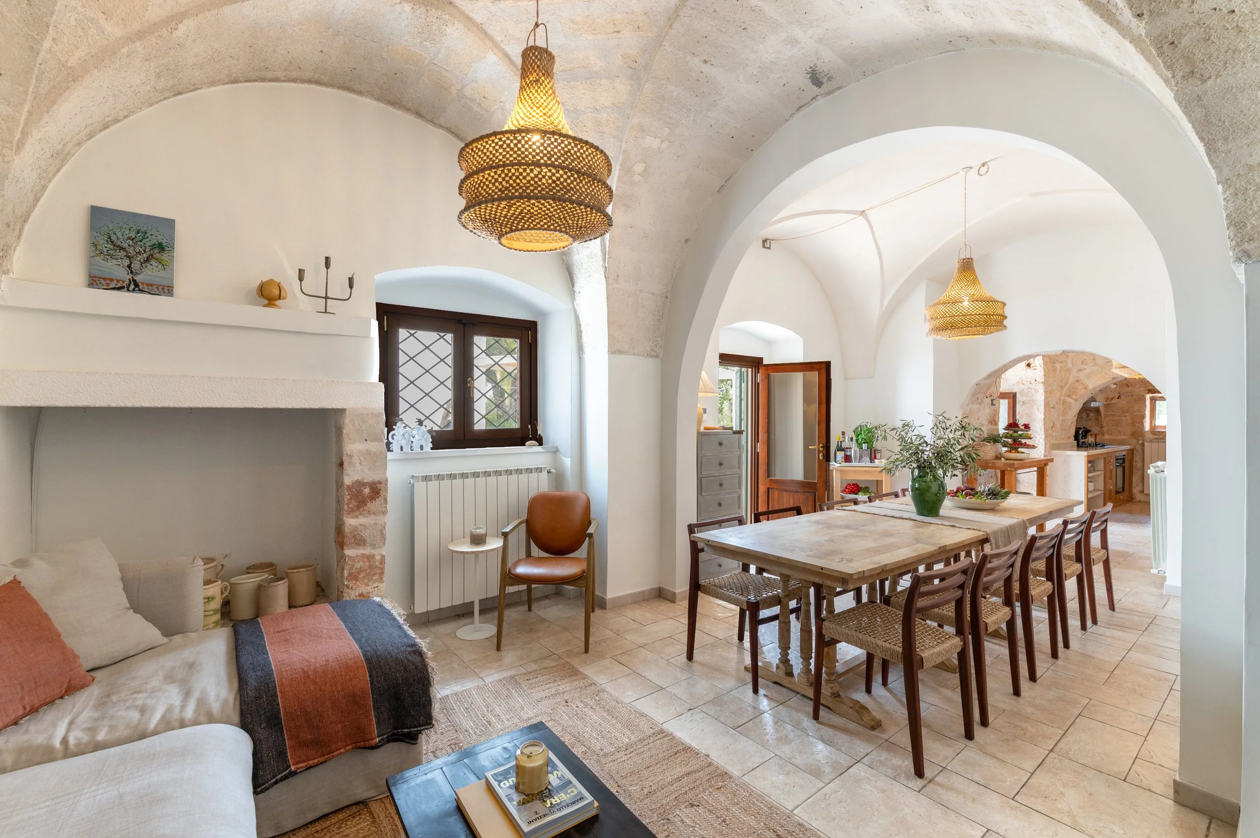 Light and bright dining room with an open door and the words Accommodations over the image