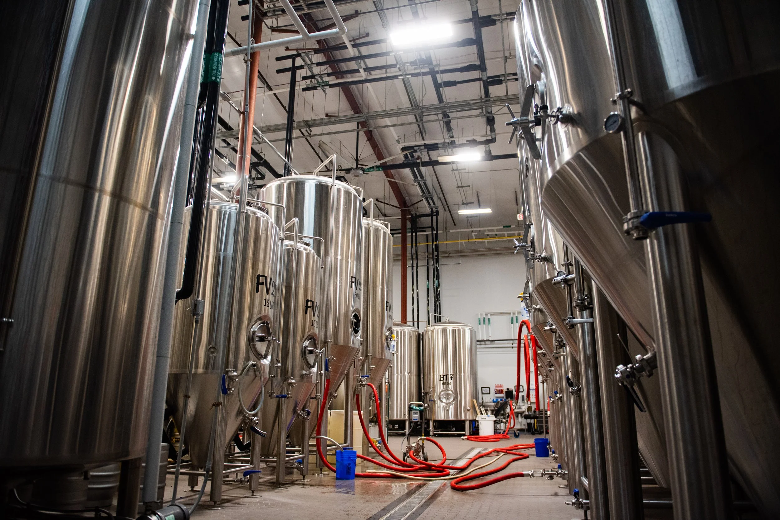 Tanks and hoses in the brewery.