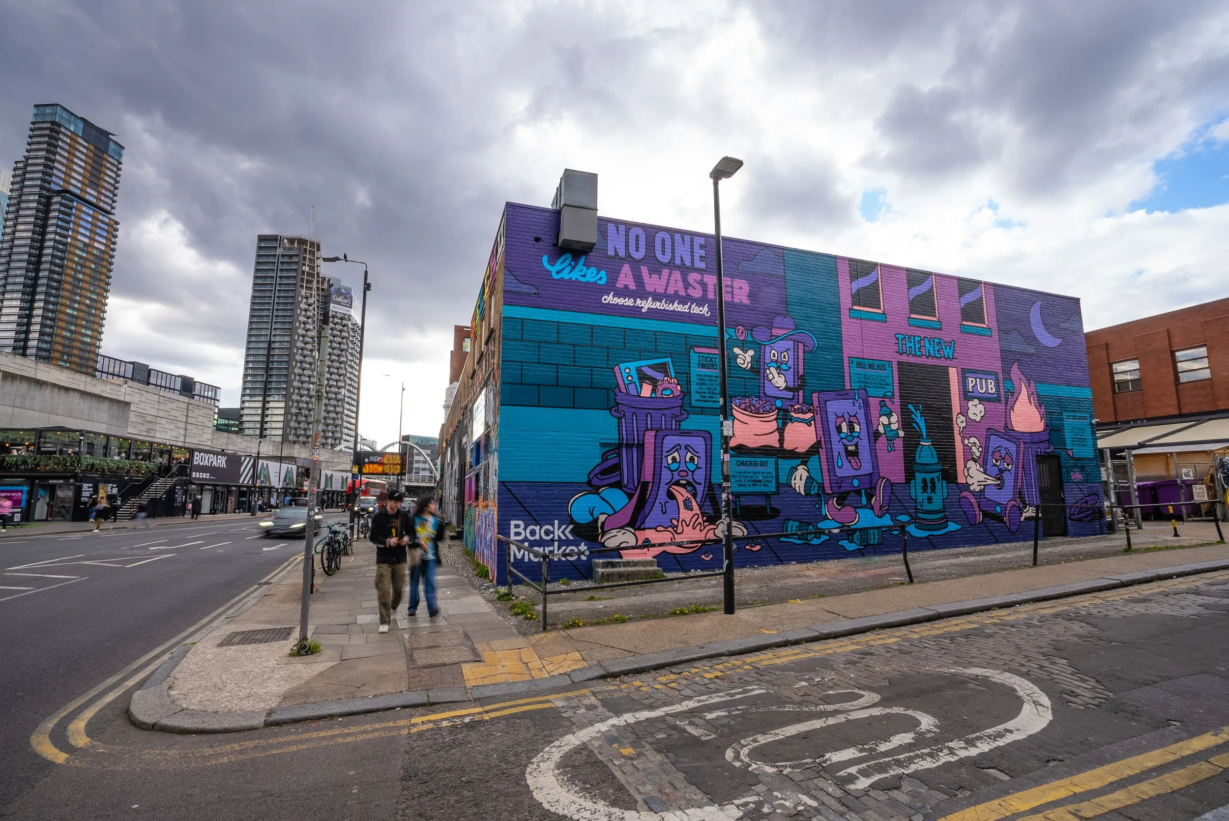 Mural by Yeye Weller, a bold, colorful, and joyful artist duo from Münster, Germany and represented by Totally Reps.