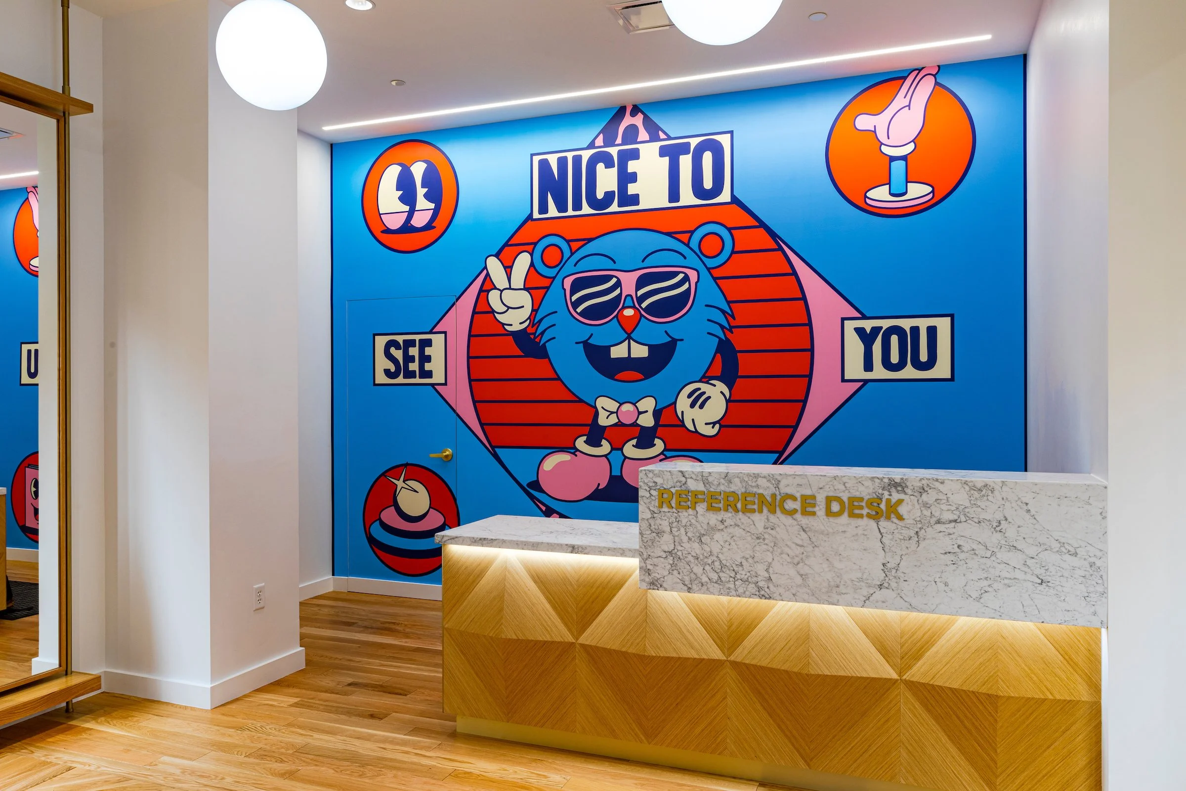 Mural by Yeye Weller, a bold, colorful, and joyful artist duo from Münster, Germany and represented by Totally Reps.