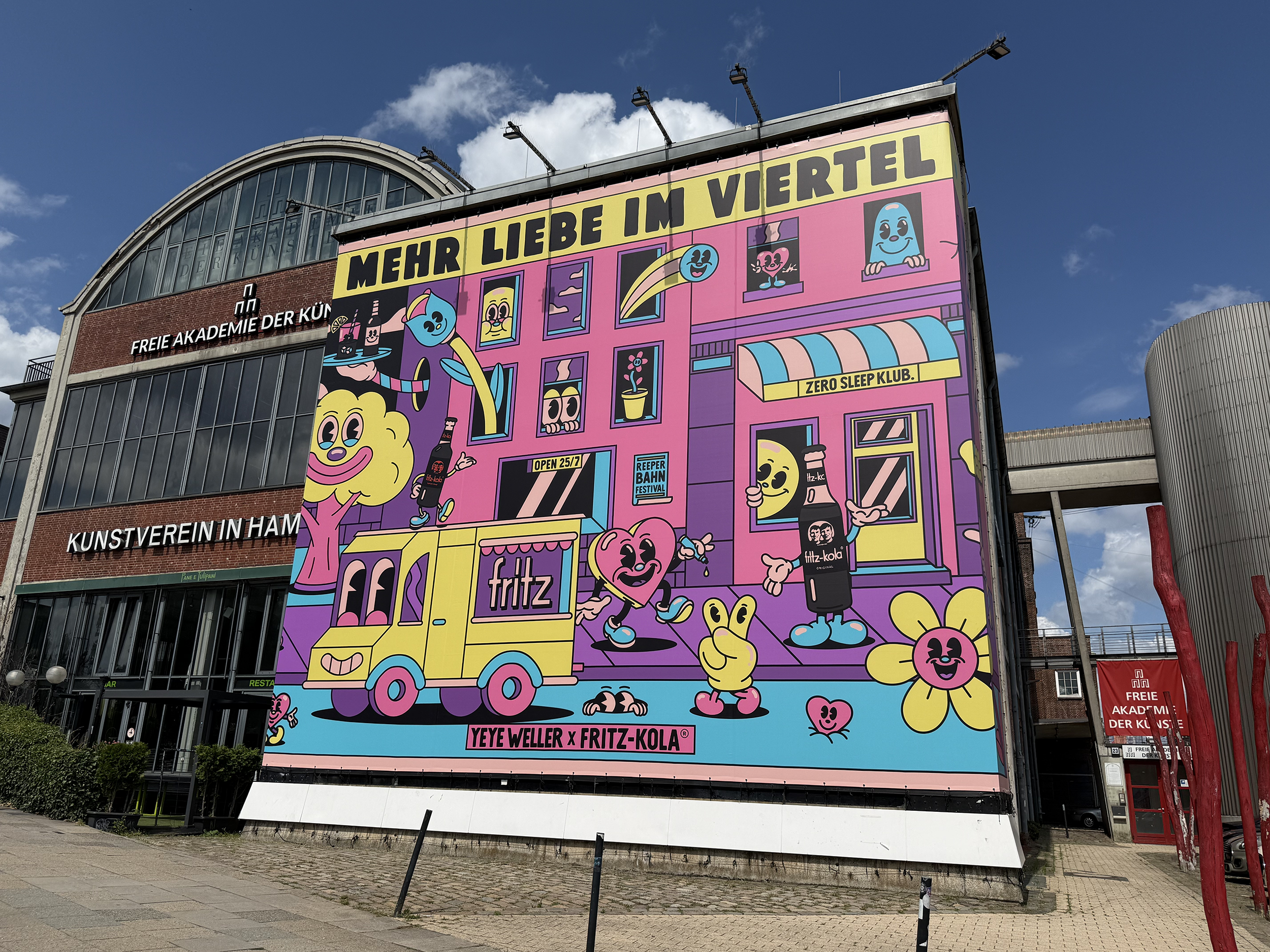Mural by Yeye Weller, a bold, colorful, and joyful artist duo from Münster, Germany and represented by Totally Reps.