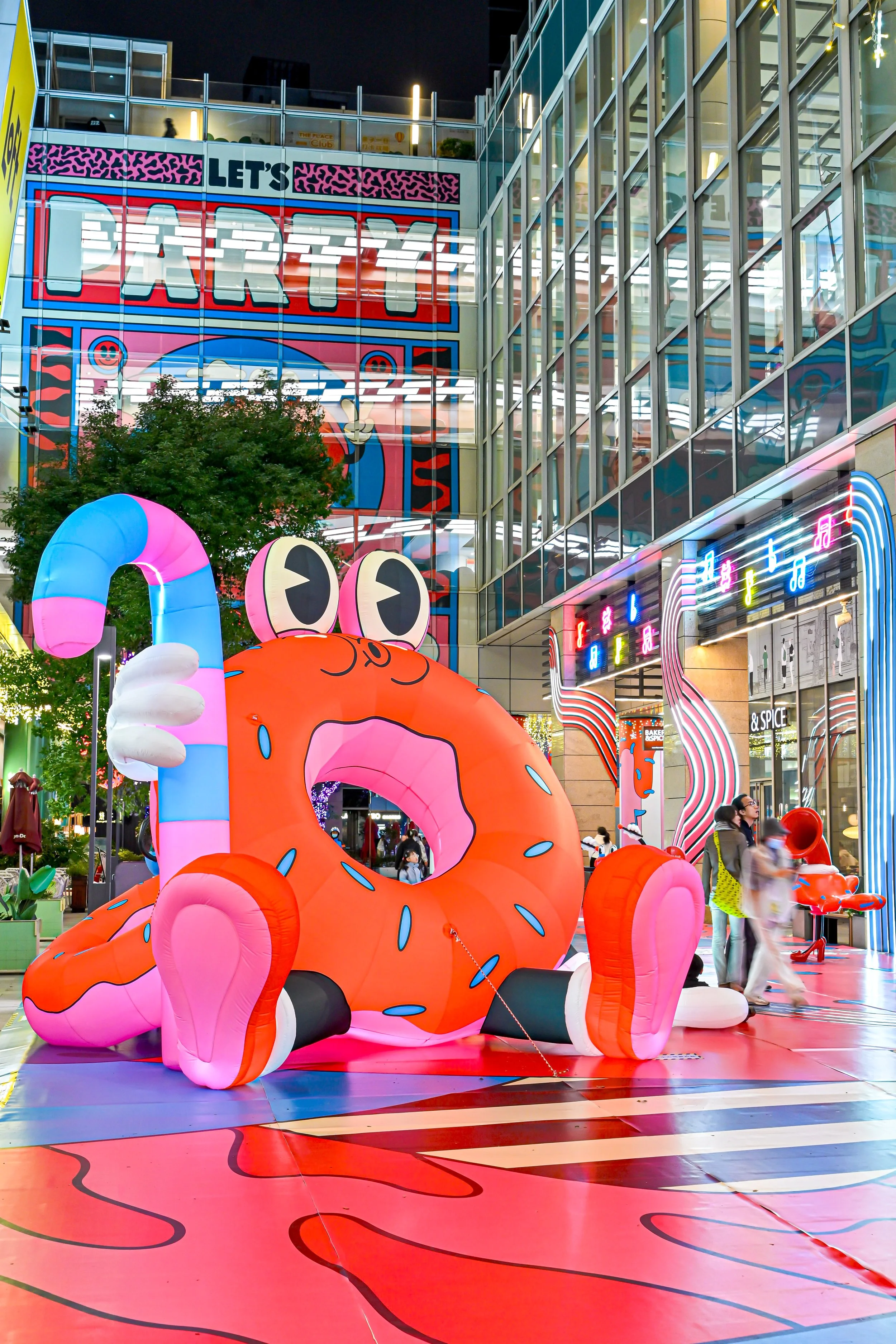 Mural by Yeye Weller, a bold, colorful, and joyful artist duo from Münster, Germany and represented by Totally Reps.