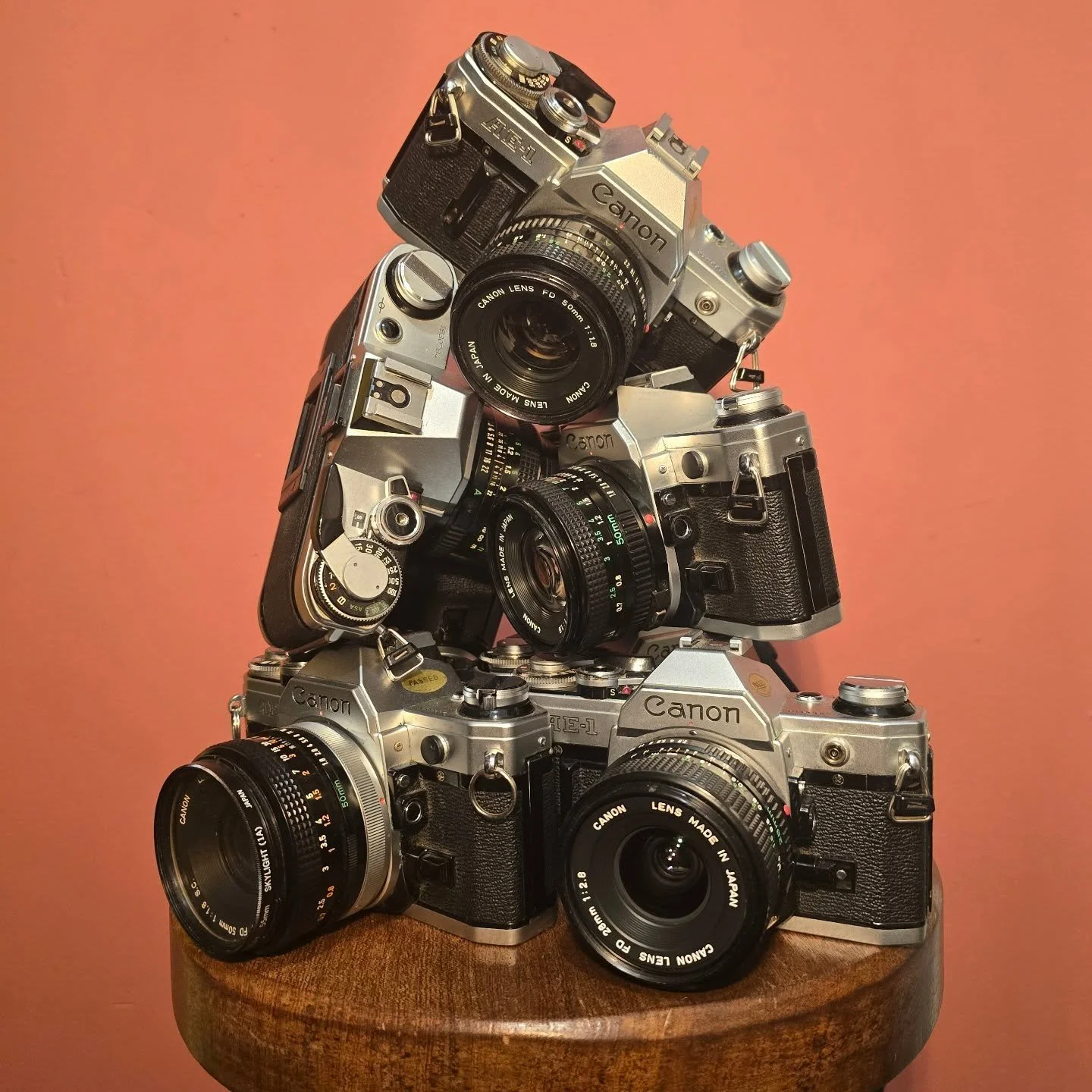 Never has there been a camera more popular in the film world than the AE-1! Hence we have an ever growing PILE of them! They are beloved for their vintage charm, great selection of amazing lenses, and ease of use for beginners and pros alike. If you'