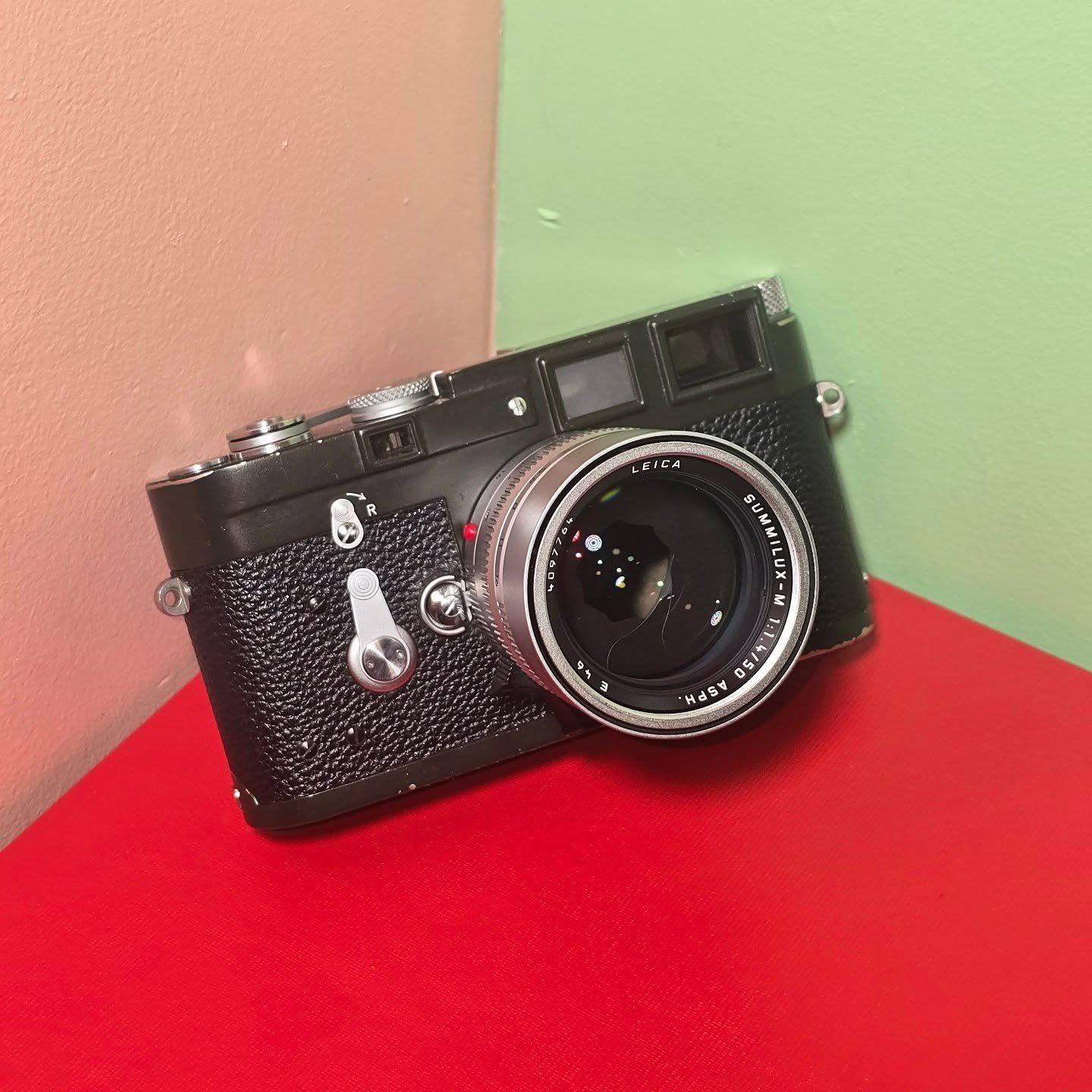 In today we have probably the nicest camera we'll ever have in for sale. This comes from my personal collection. This is a one of one dark green M3 with an upgraded M4 loading kit installed. On the front is the legendary 50mm summilux asph. This lens