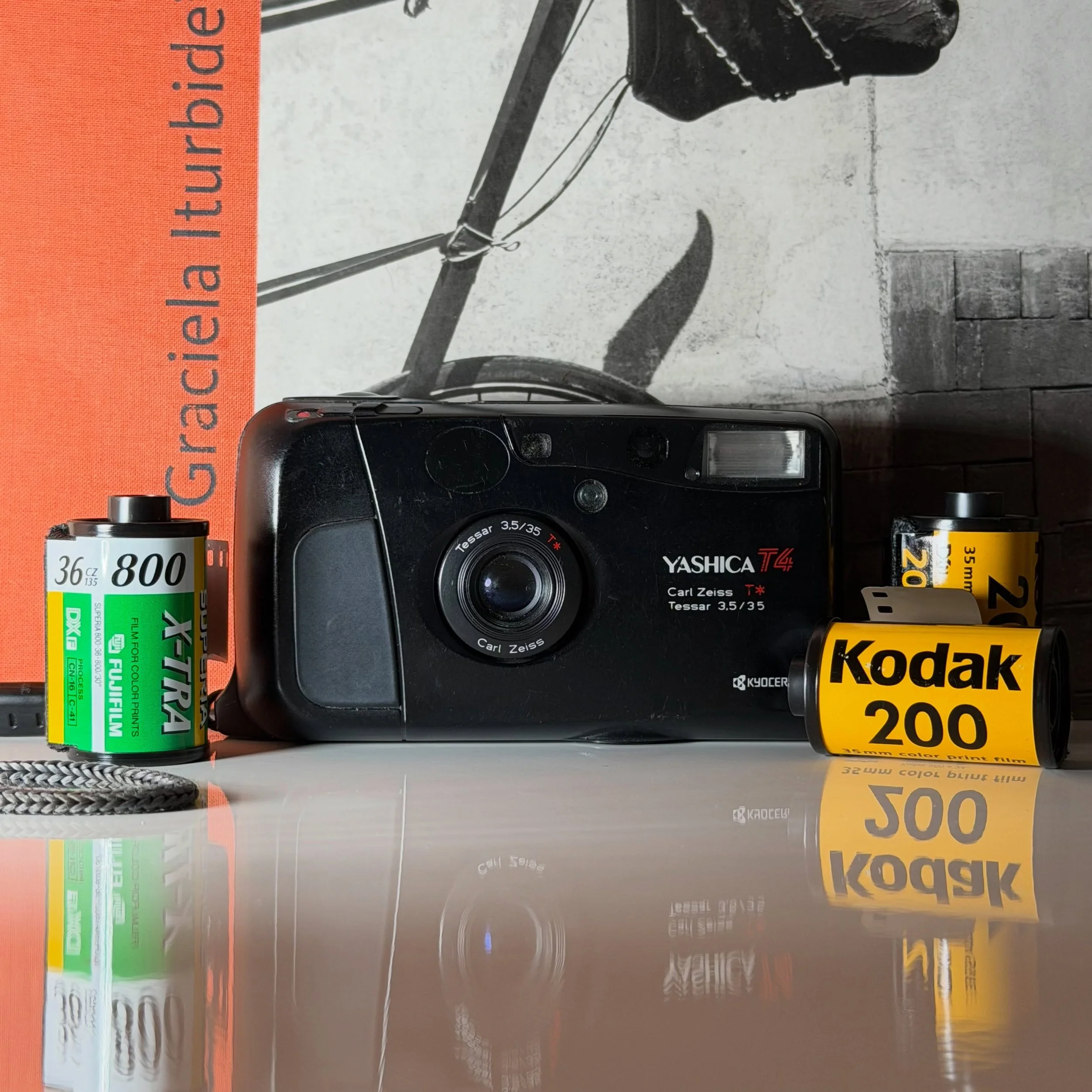 If you&rsquo;re looking for a top of the line point and shoot that lives up the hype, this is the one! The Yashica T4 needs no introduction with an incredibly sharp 35mm focal length Zeiss lens and a small but mighty flash. It&rsquo;s quick and pocke