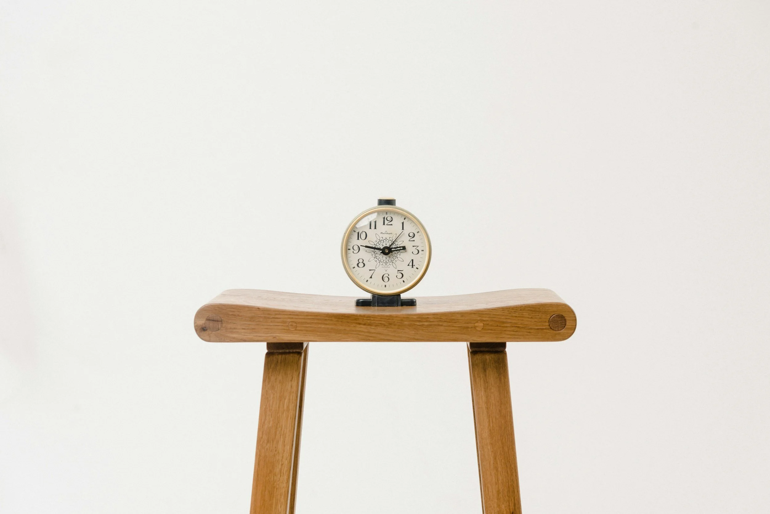 Old Clock on a Wood Stool | Early Signs of Perimenopause
