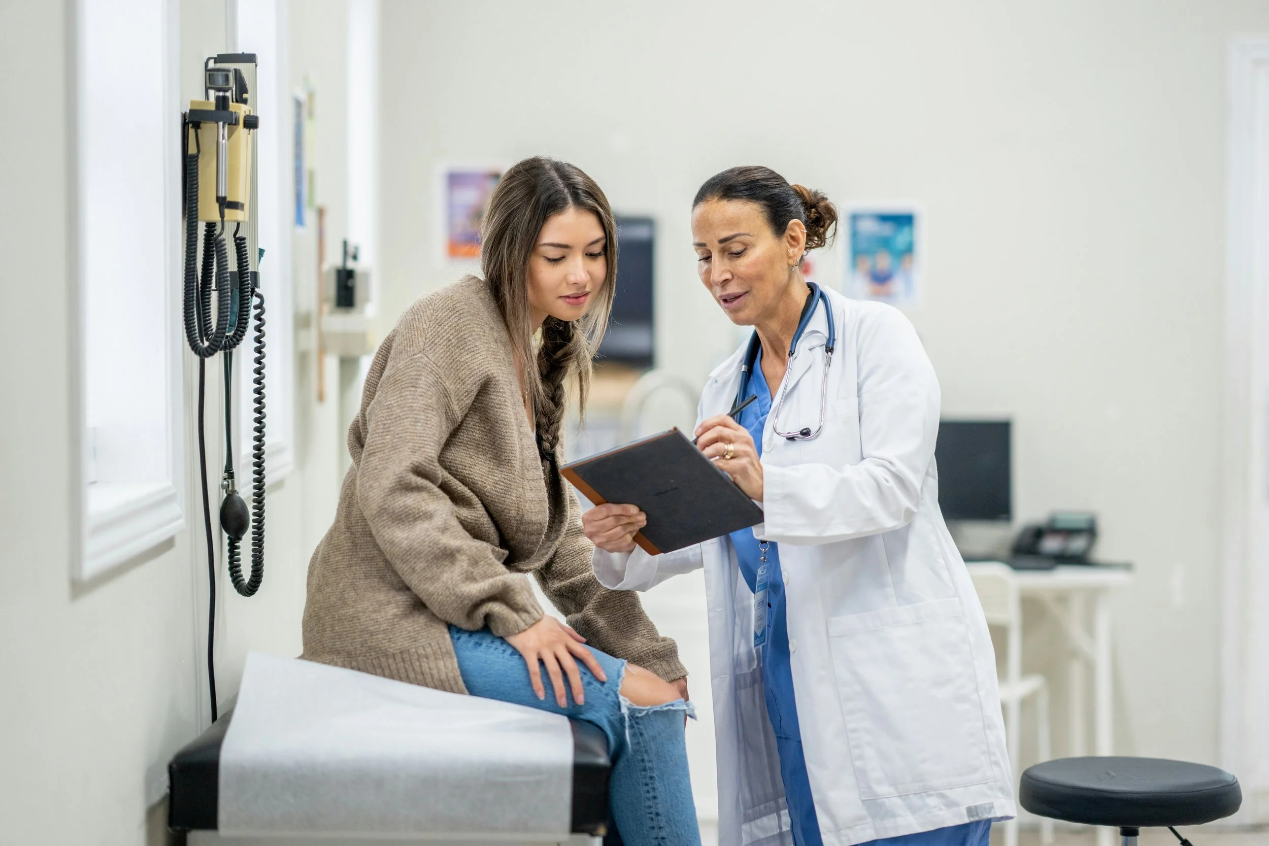 Female Patient and Doctor discussing Medical Information | Can you diagnose perimenopause? | Scarlet Oak Wellness