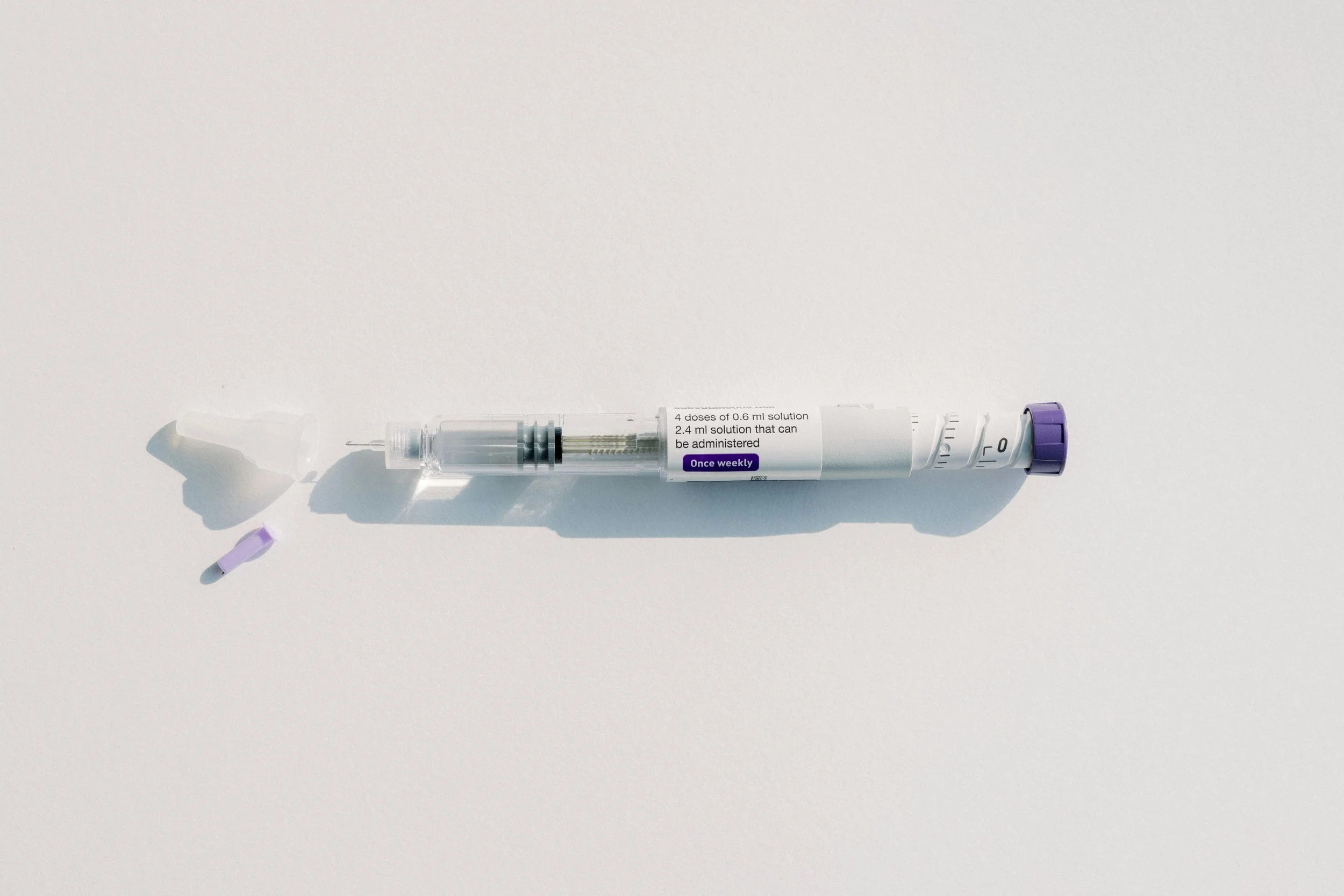 GLP-1 Shot on table | GLP-1s, Inflammation, and Metabolic Health