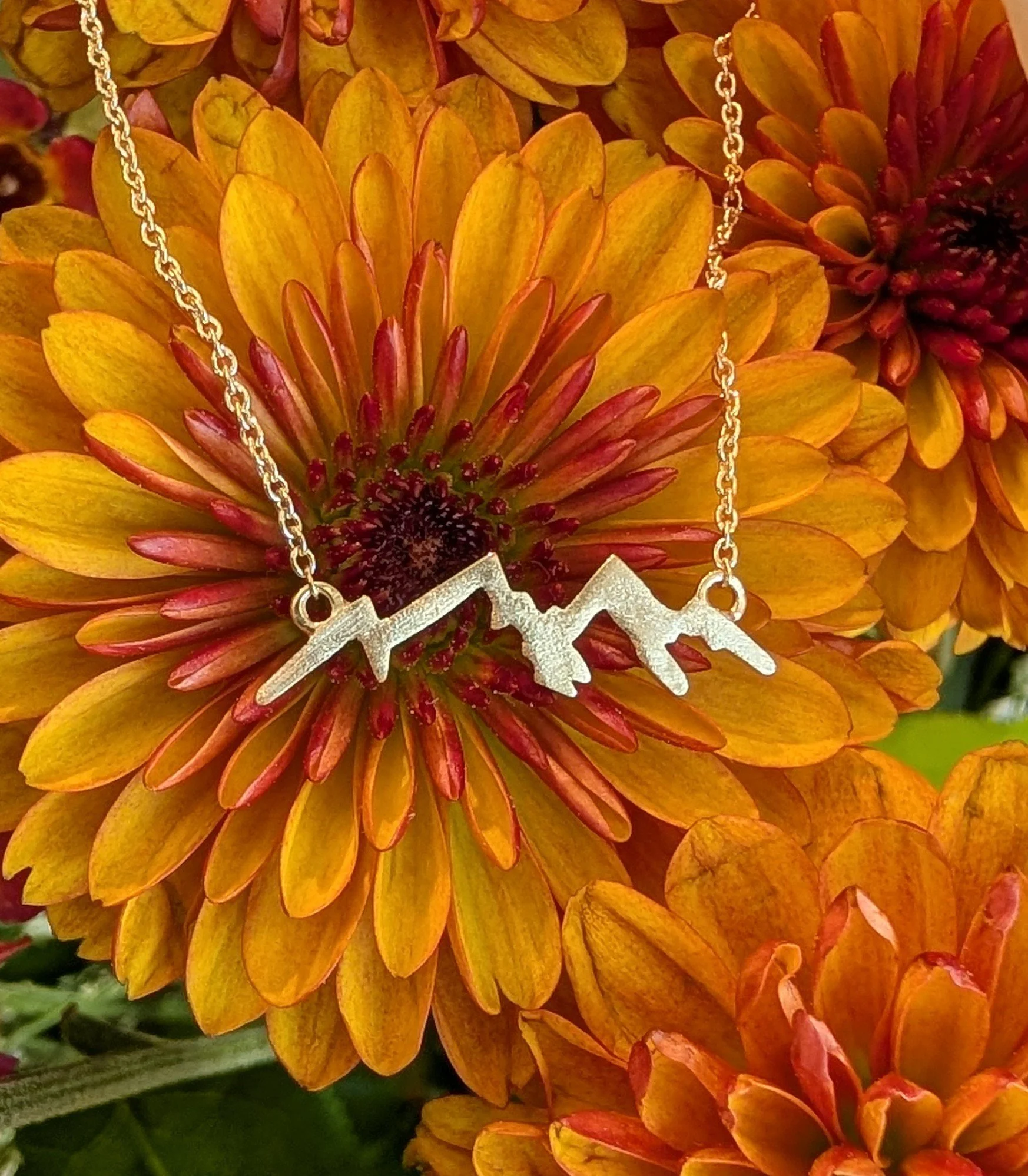 14k Yellow Gold Textured Mountain Scene Necklace.jpg