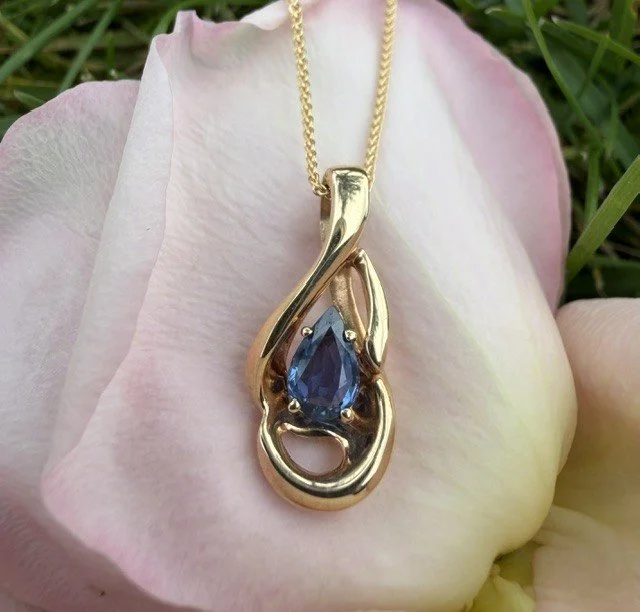Beautiful Pear Shaped Yogo Sapphire Pendant.jpg