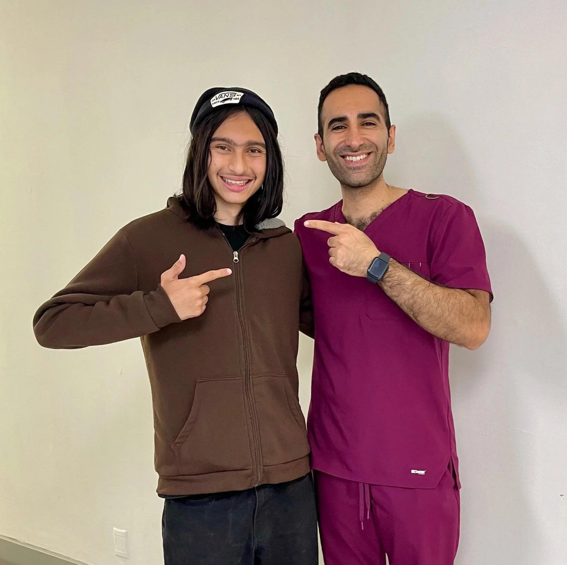 smiling with Dr. Nourian after braces removed