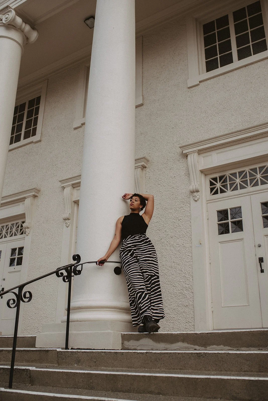 Portrait of a black woman at a beautiful heritage building in Victoria, BC