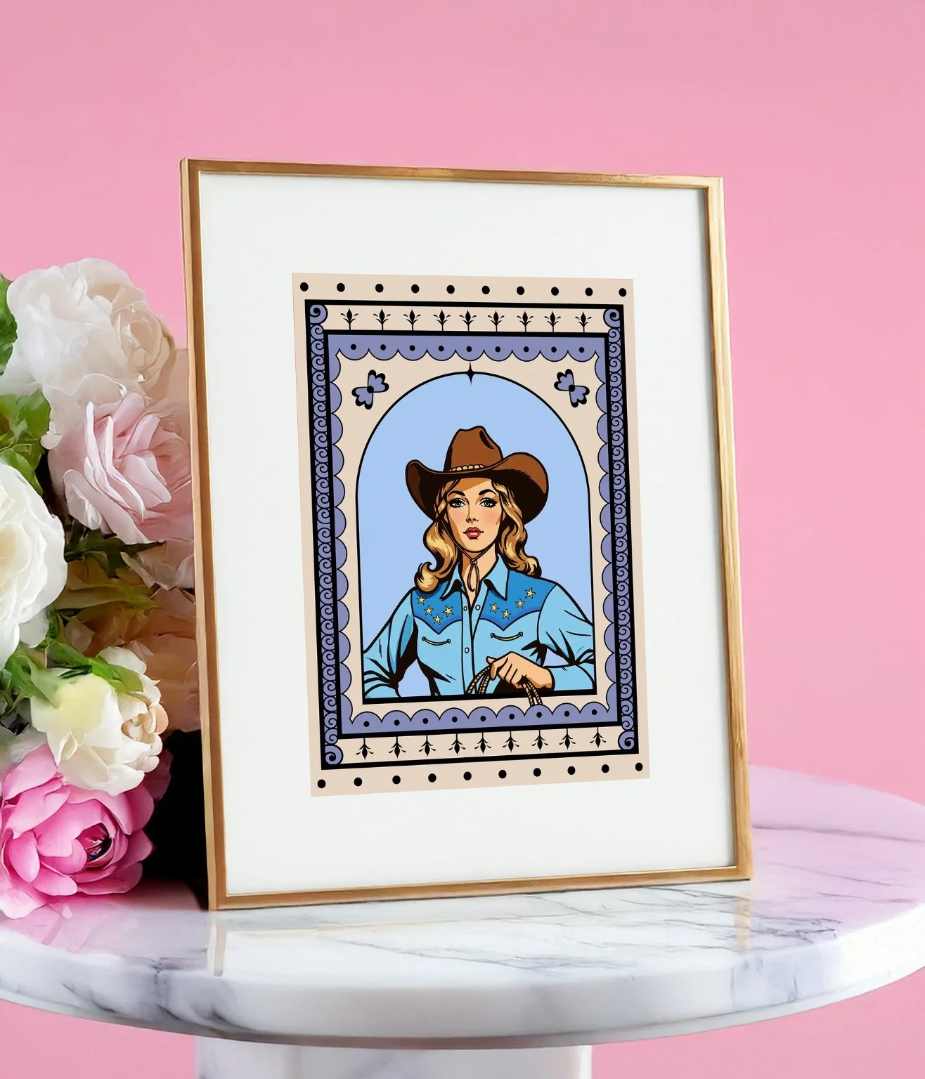 Framed cowgirl art print in gold tabletop frame with white mat
