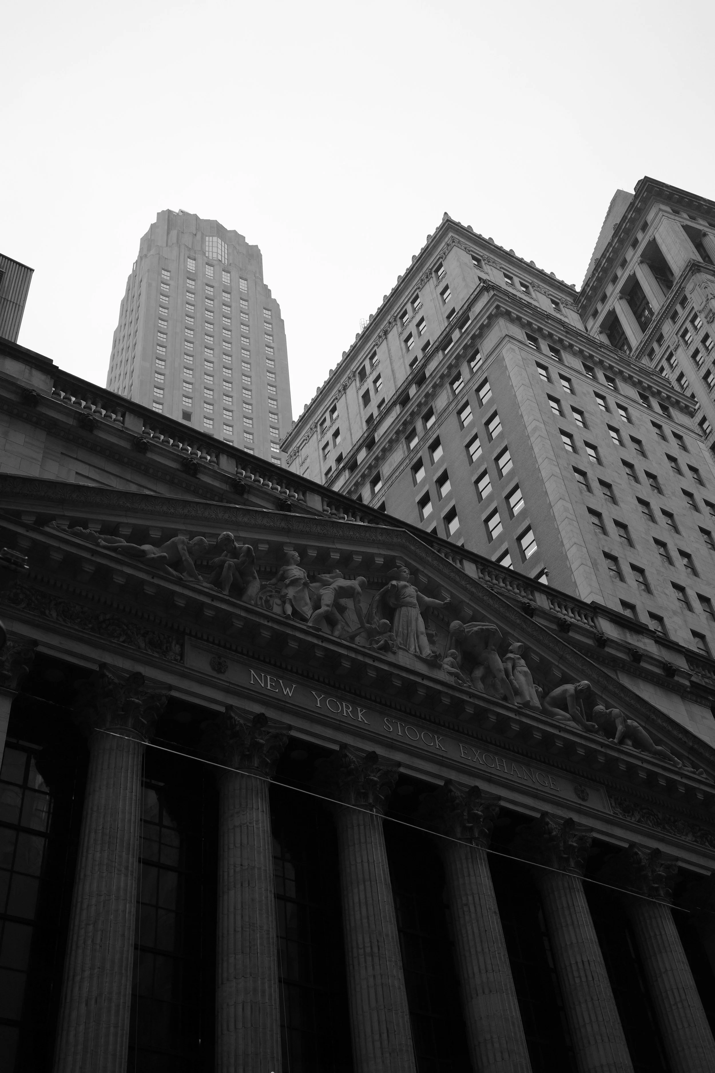 Moody photograph of Wall Street used as mood inspiration for the project's visual tone