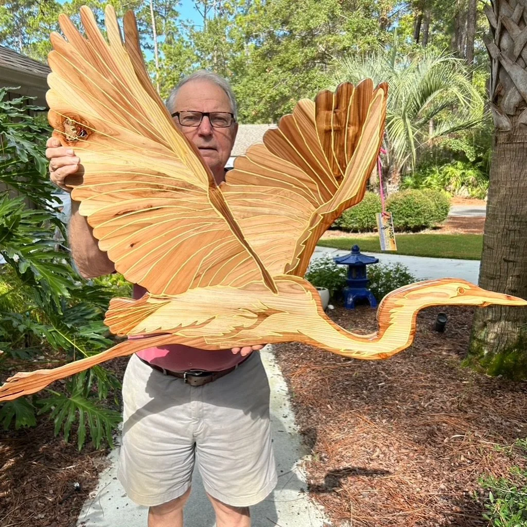 Bring the beauty of the Lowcountry coast into your home with Beachside Wood Art by artist Peter Brunn! 

Every piece is handcrafted from select cedar wood, making each creation truly one-of-a-kind. No two egrets or coastal scenes are ever exactly the