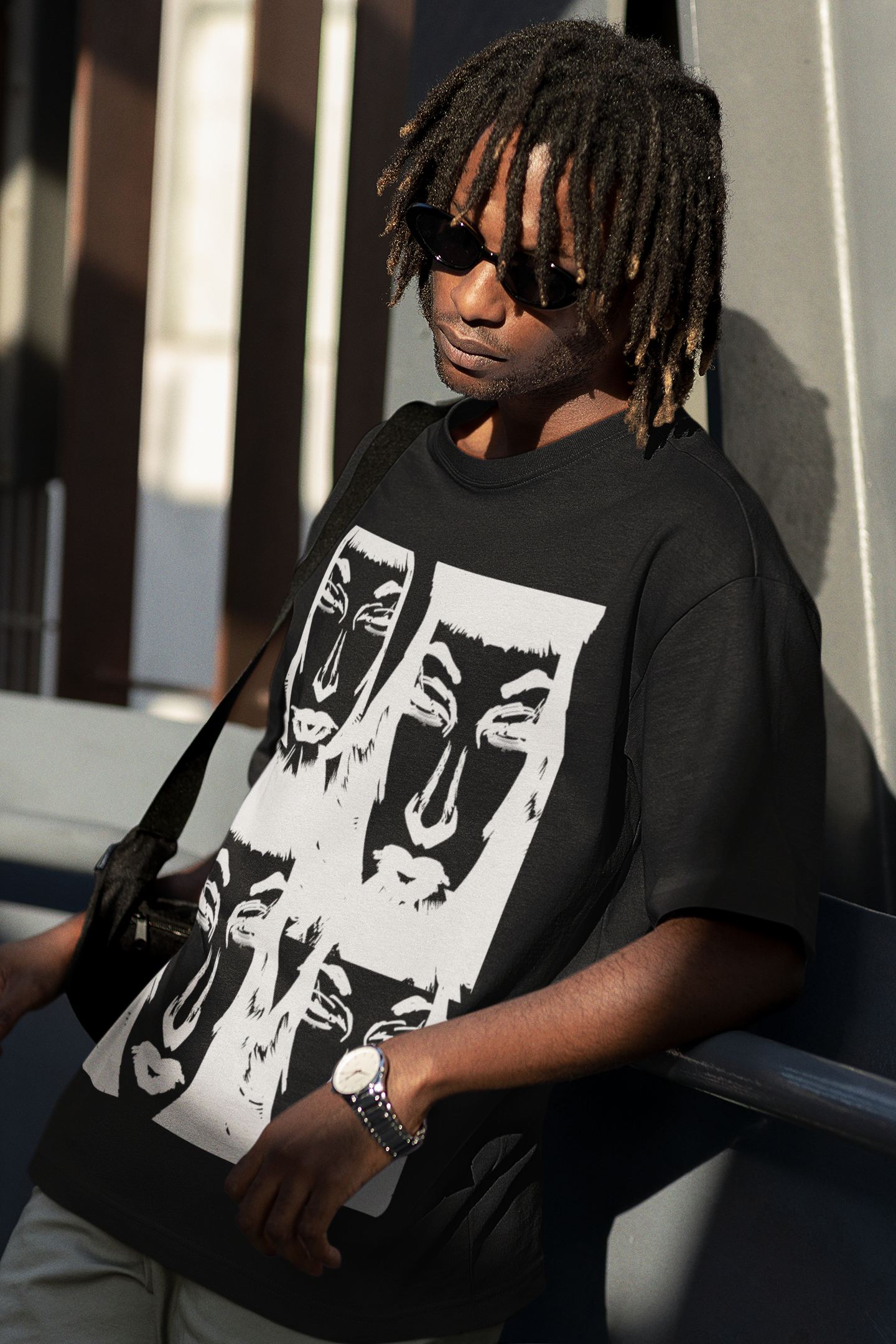 oversized-tee-mockup-of-a-man-with-locs-posing-in-a-railing-m25229.png