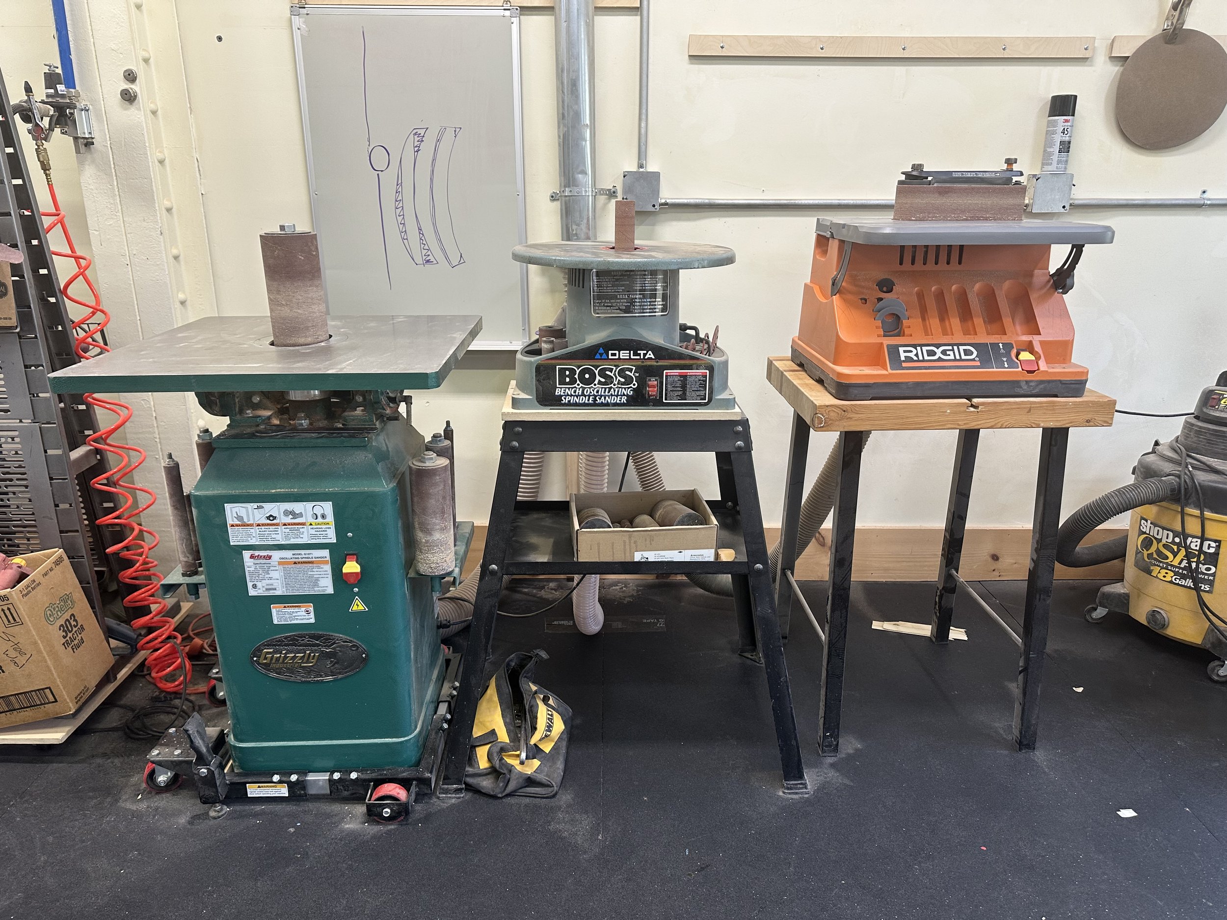 Oscillating spindle sanders