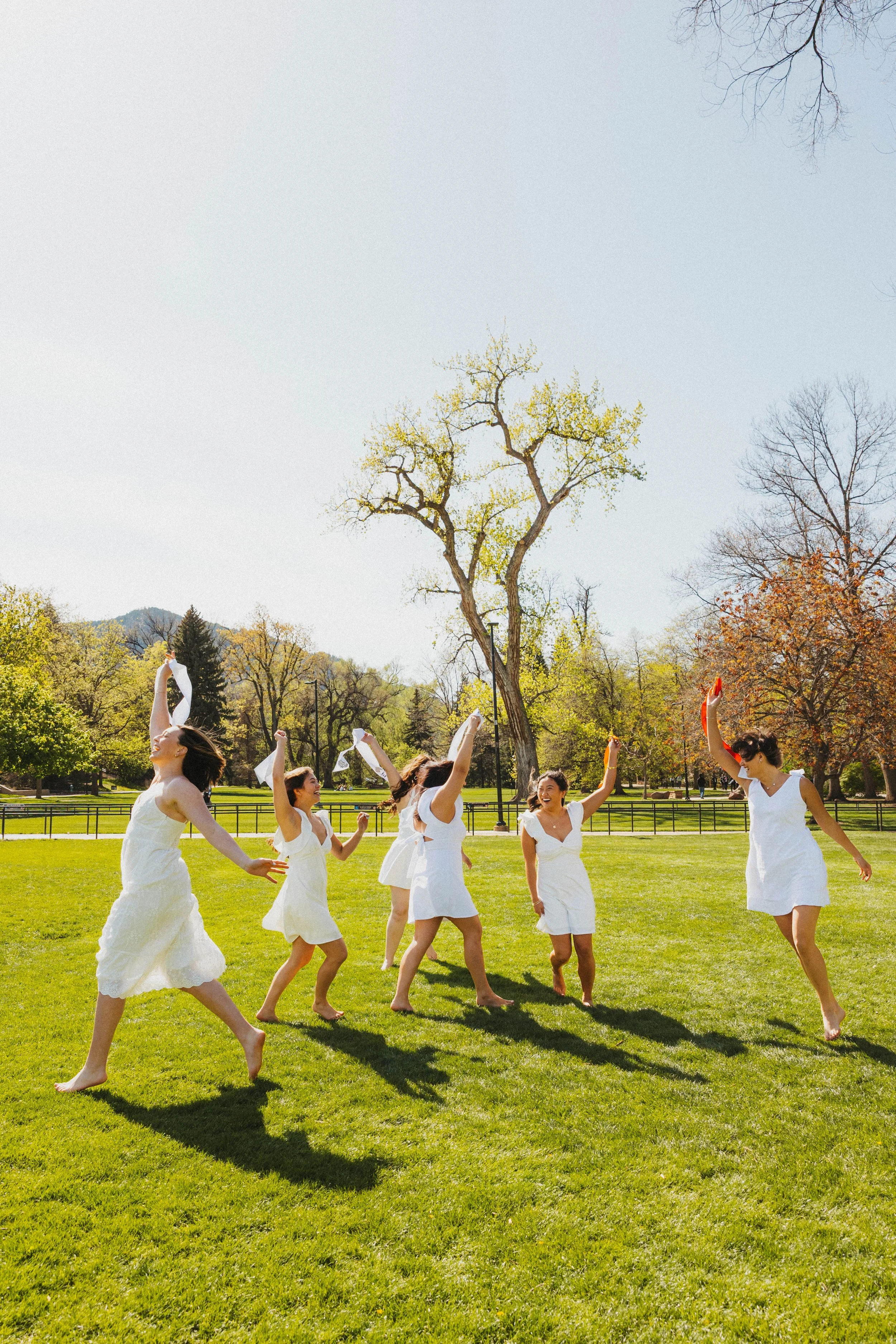 Girls running around with stoles