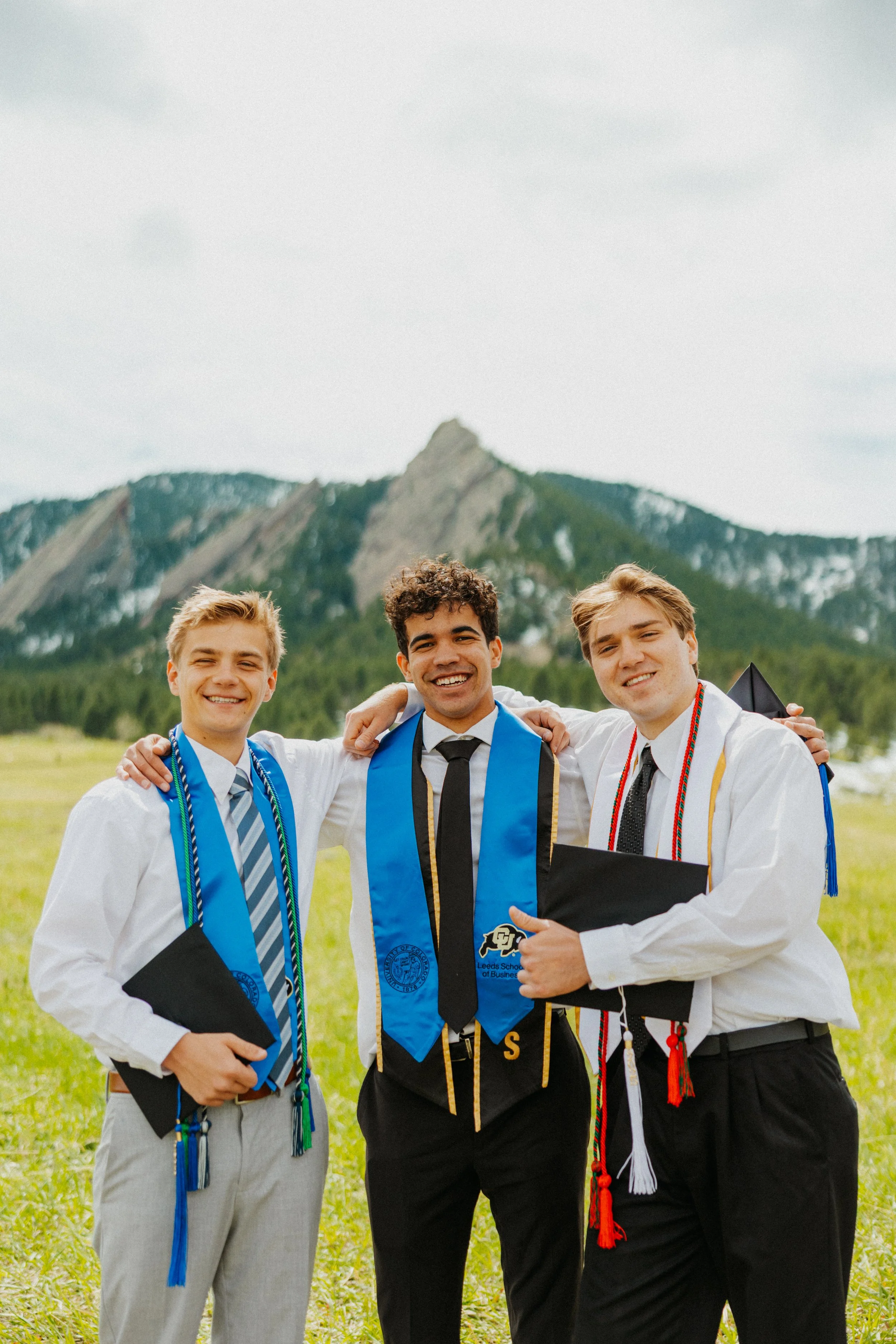Group of graduates posing together at Chautauqua Park