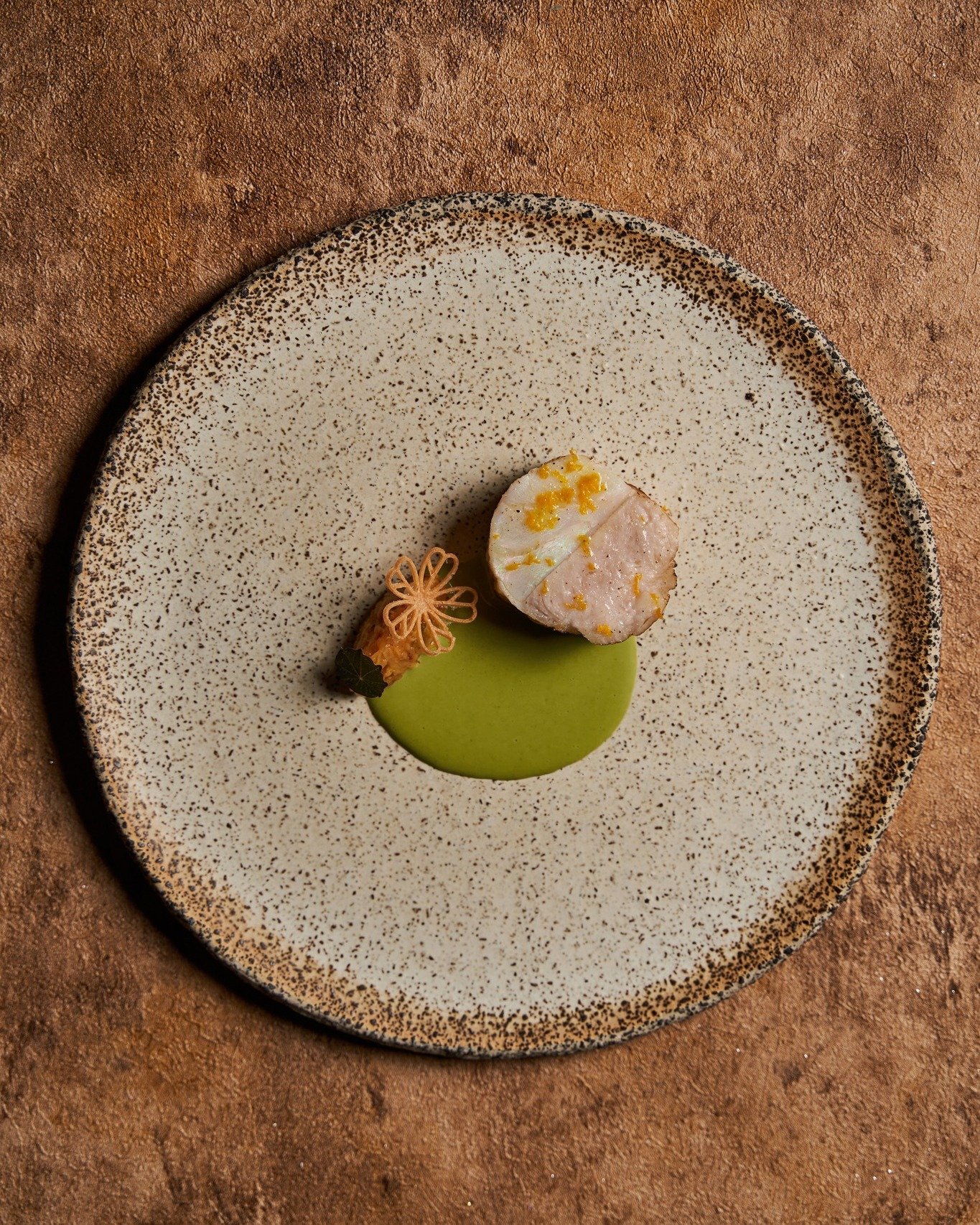 Explore the marriage of land and sea with our MonkBread, paired with the Colombian nasturtium plant, utilising every part from root (Mashua) to stem and leaves. A tribute to Latin America&rsquo;s untamed flavors, reimagined with reverence.

探索陸地與海洋的絕
