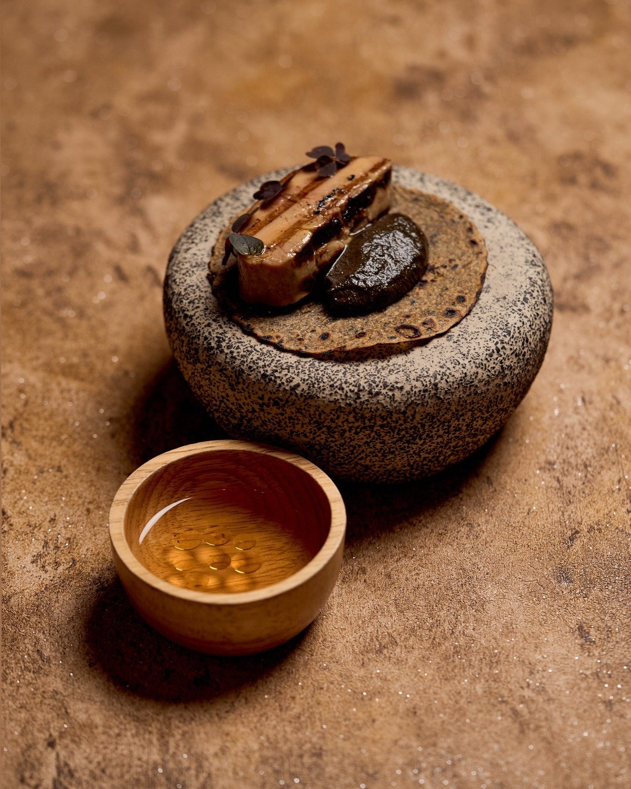 Our luxurious take on the Mexican taco. A flash seared French foie gras, nestled on a homemade black sesame tortilla with a hint of balsamic vinegar. Finished with our signature black mole, a complex blend of 21 ingredients.

Available as part of our