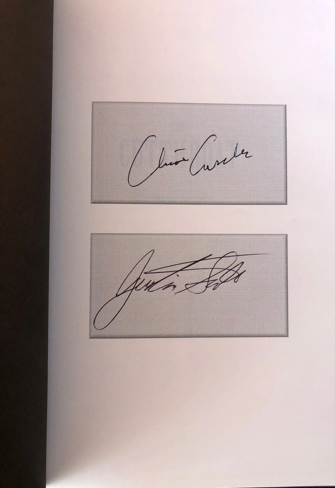 Two Clive Cussler First Editions Signed 2.jpg