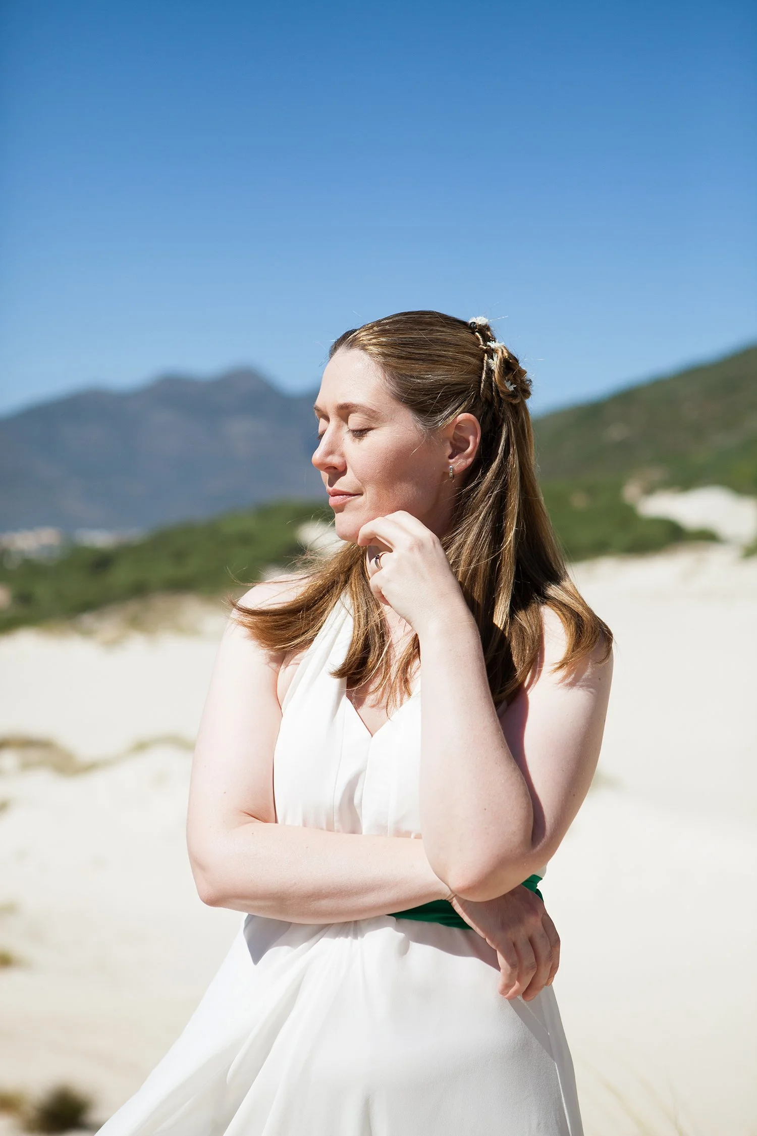 portrait of same sex bride with face in sun