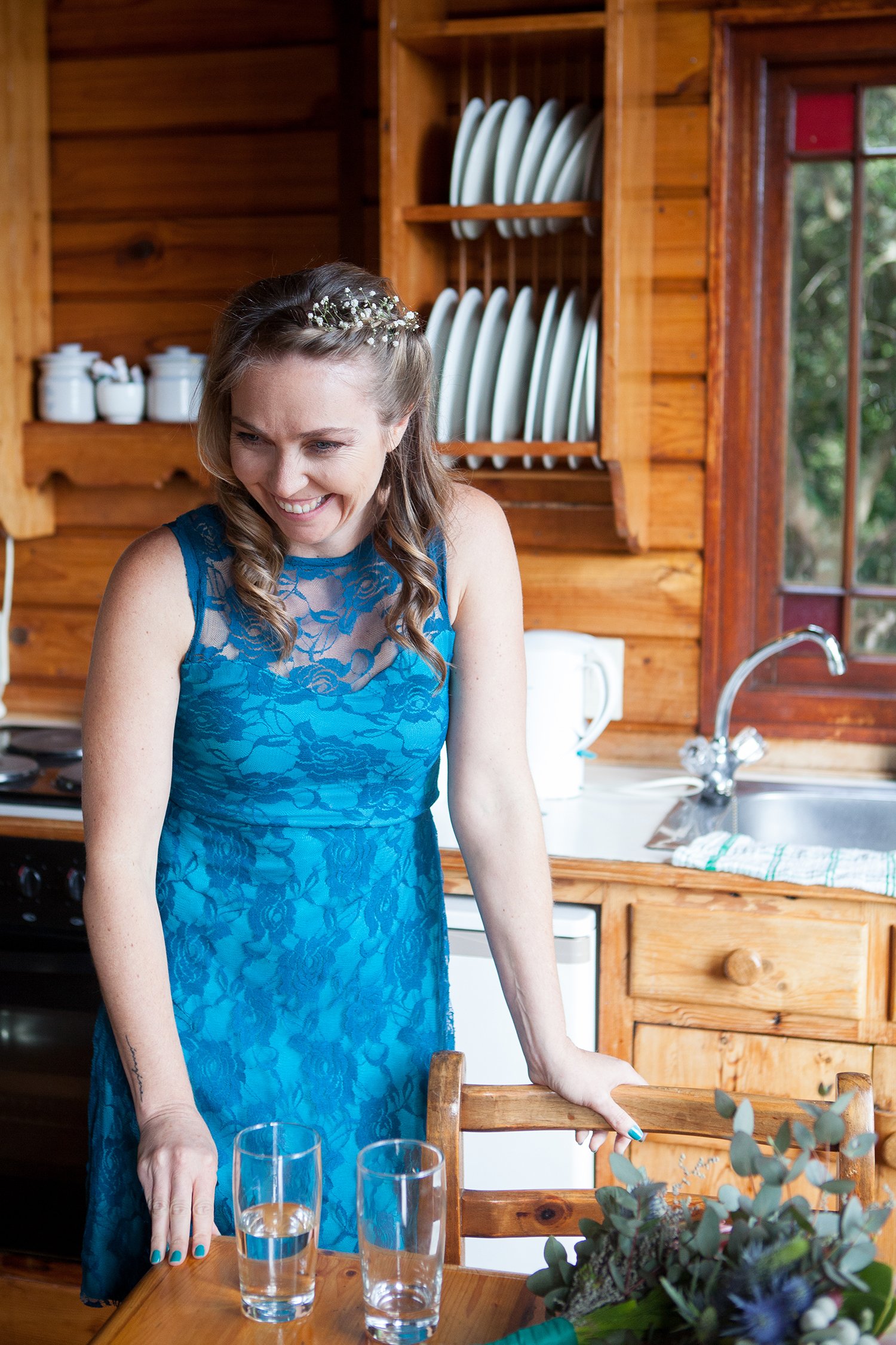 bridesmaids with blue dress laughing