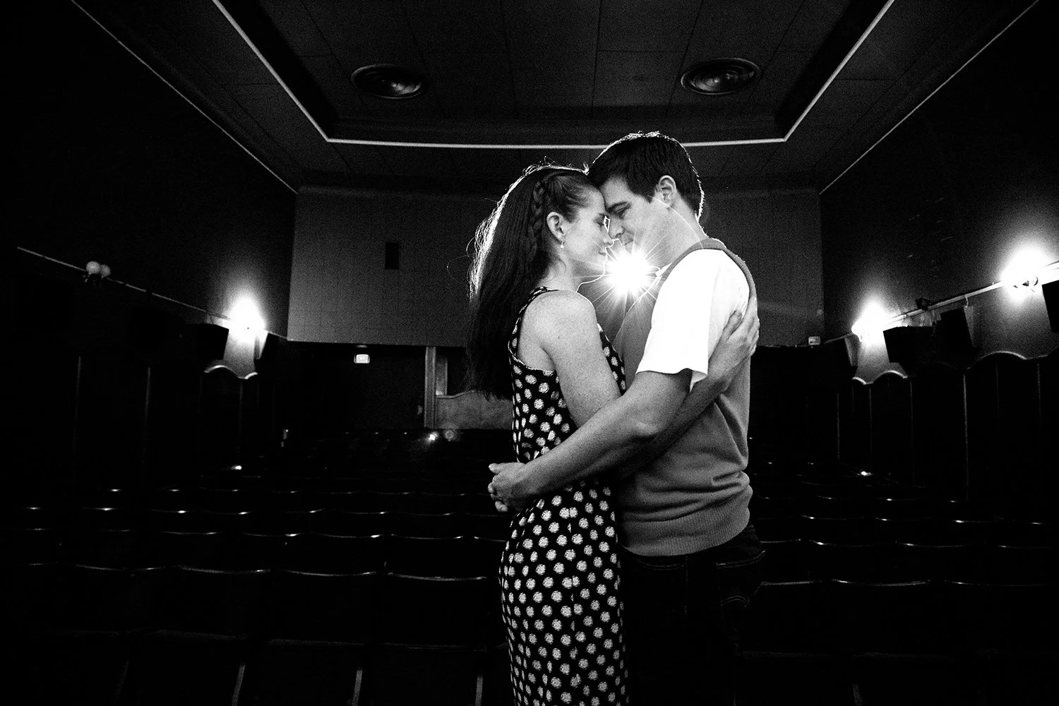 couple hugging in cinema during couple shoot