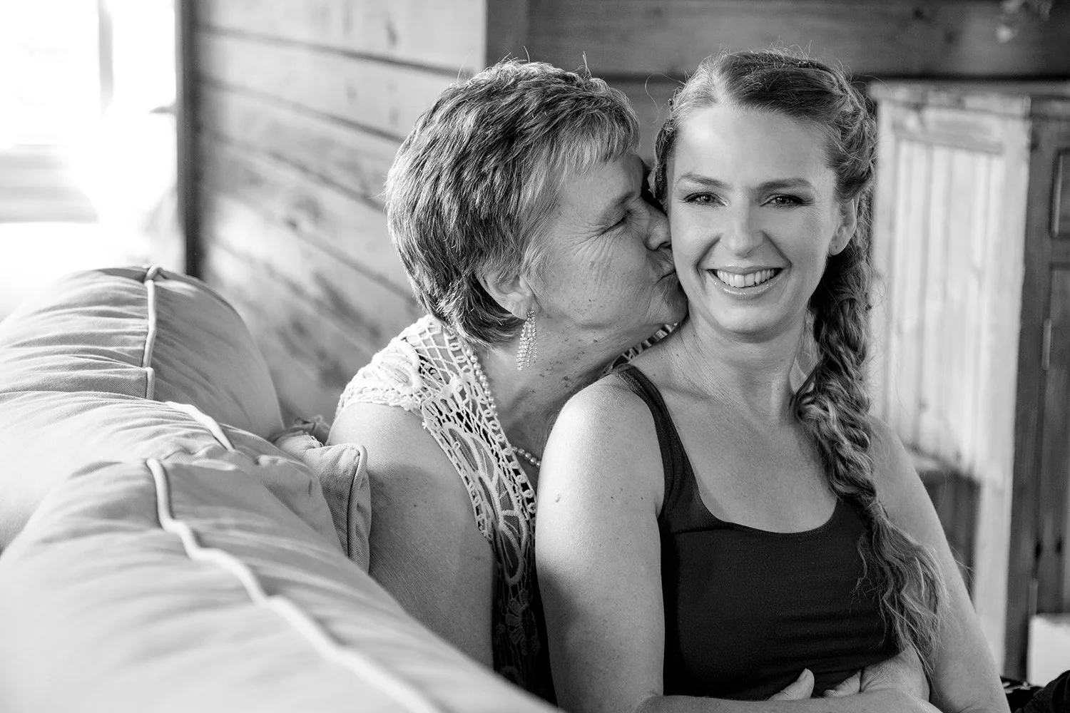 bride kissed by her mom