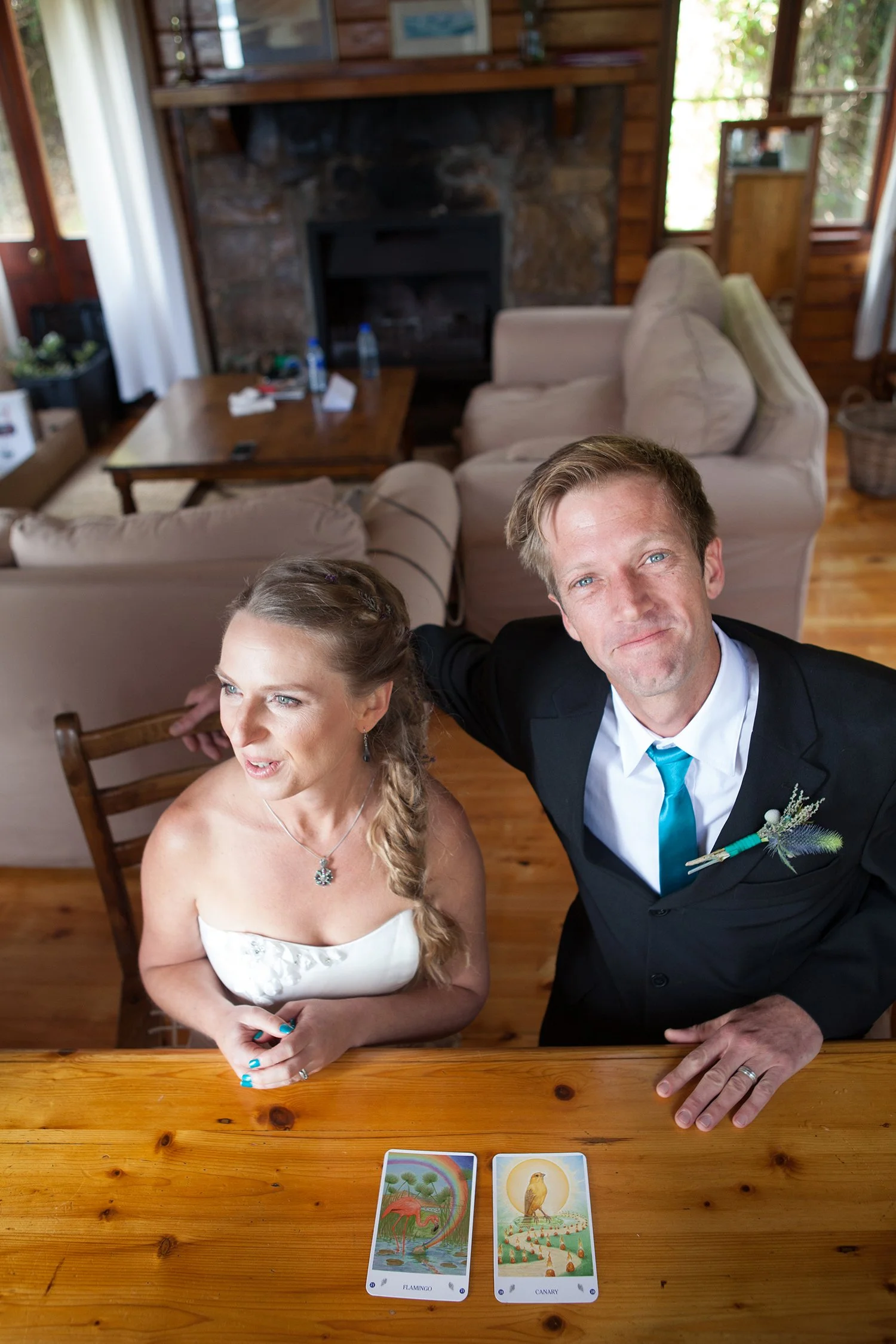 bride and groom sitting at table