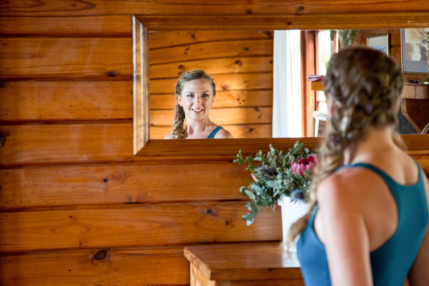 bride looking in mirror