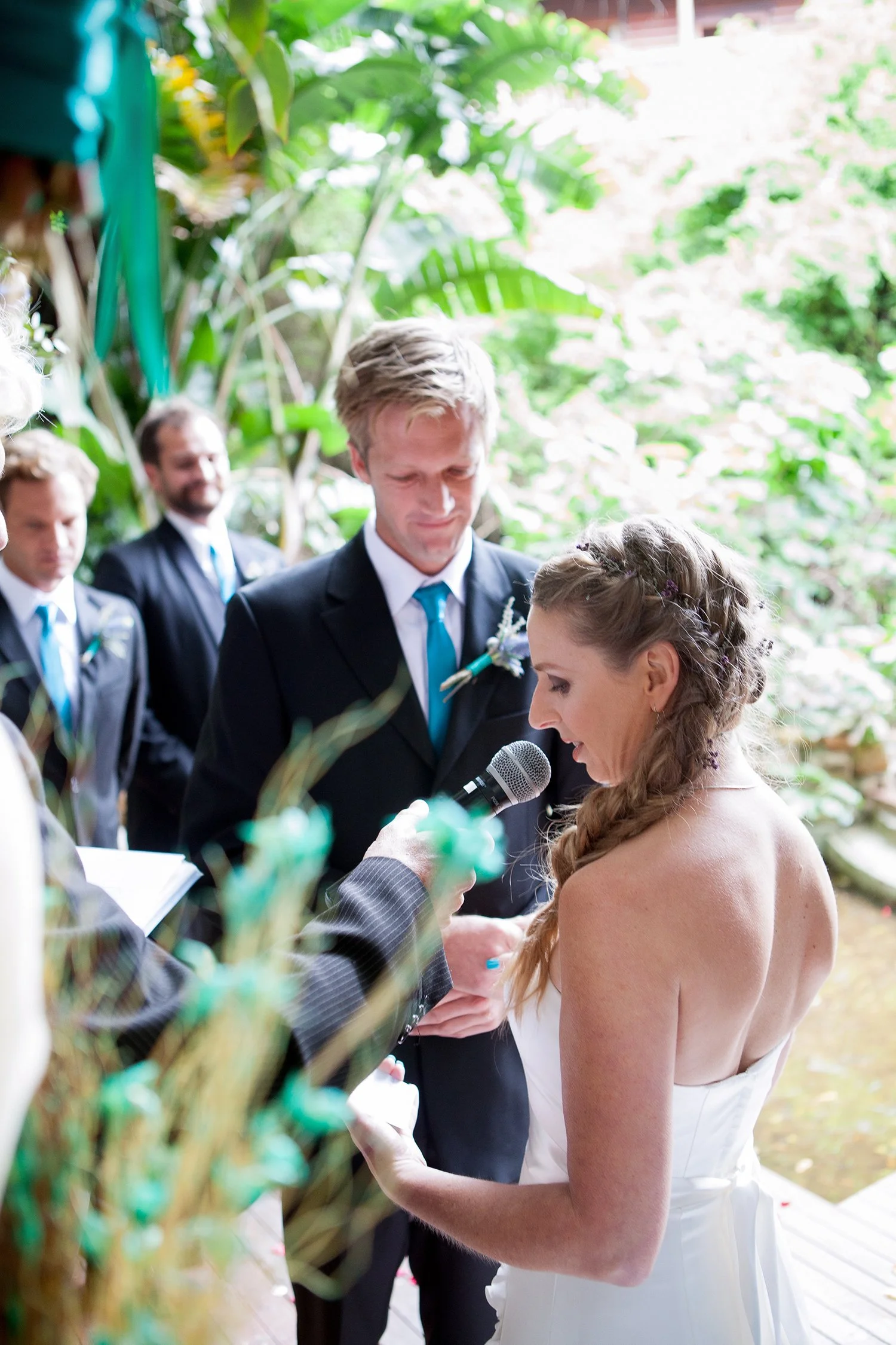 bride speaking in microphone during wedding ceremony
