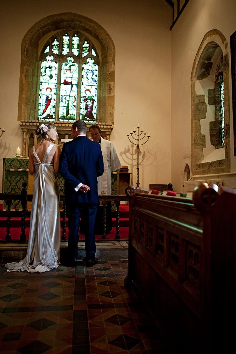 portrait of bride and groom in church