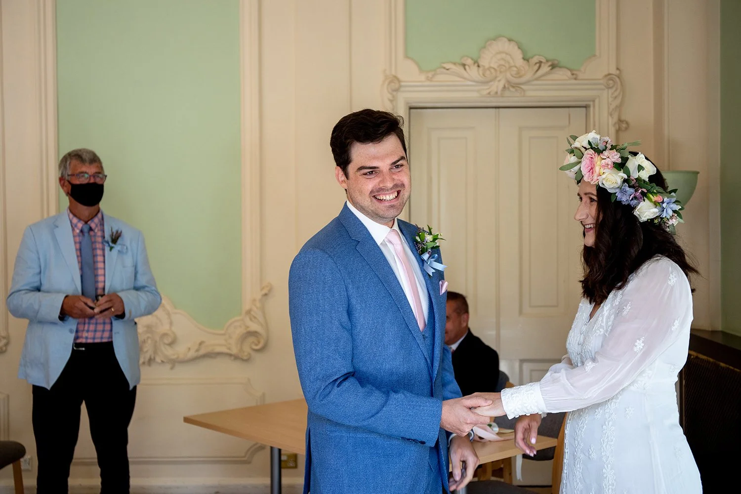 bride and groom gettimg married at totnes town hall devon