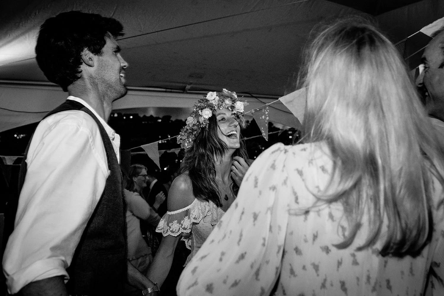 bride on a dance floor smiling