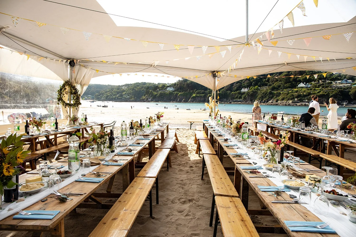 wedding dinner table on beach in devon