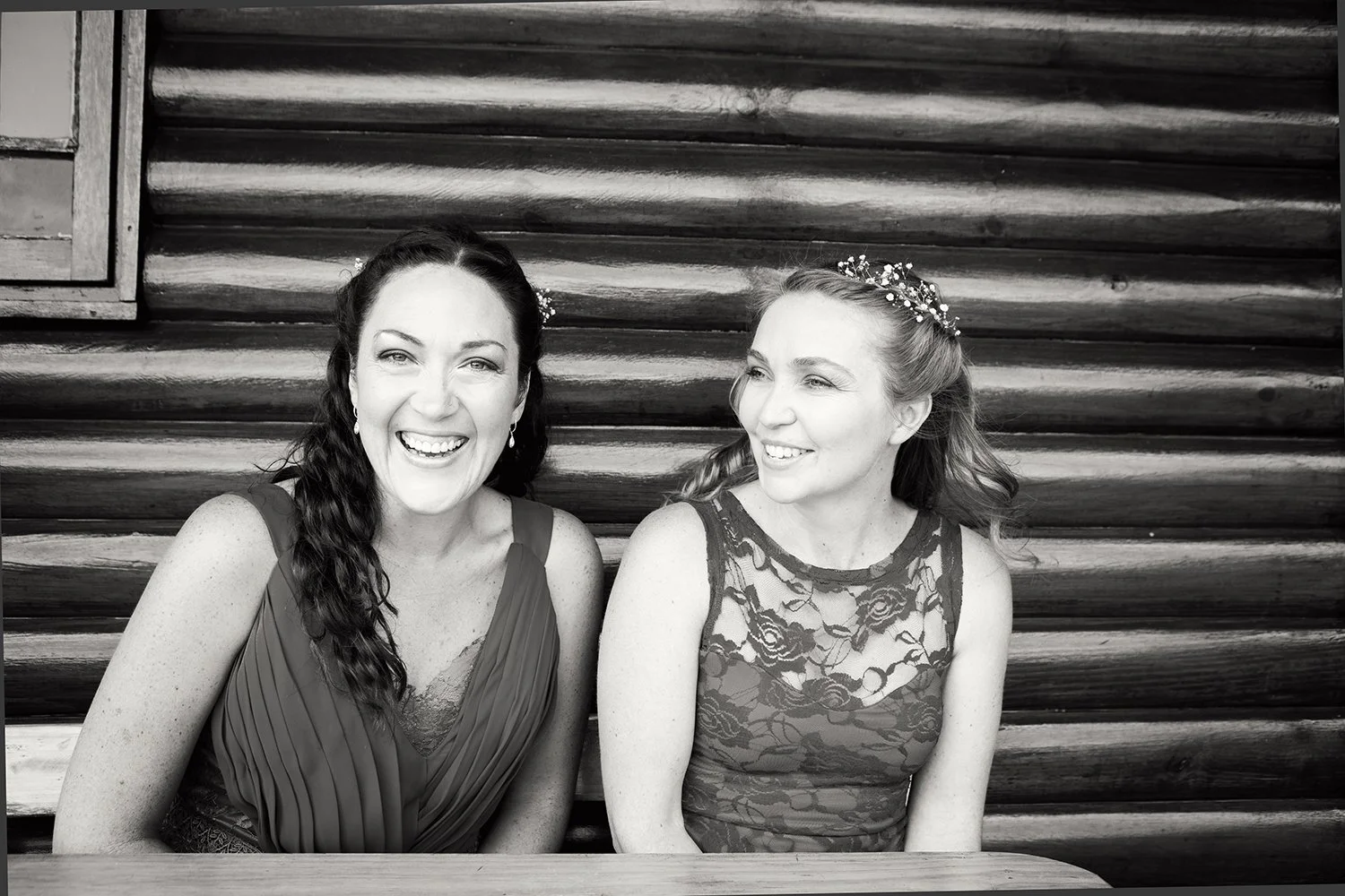 two bridesmaids laughing