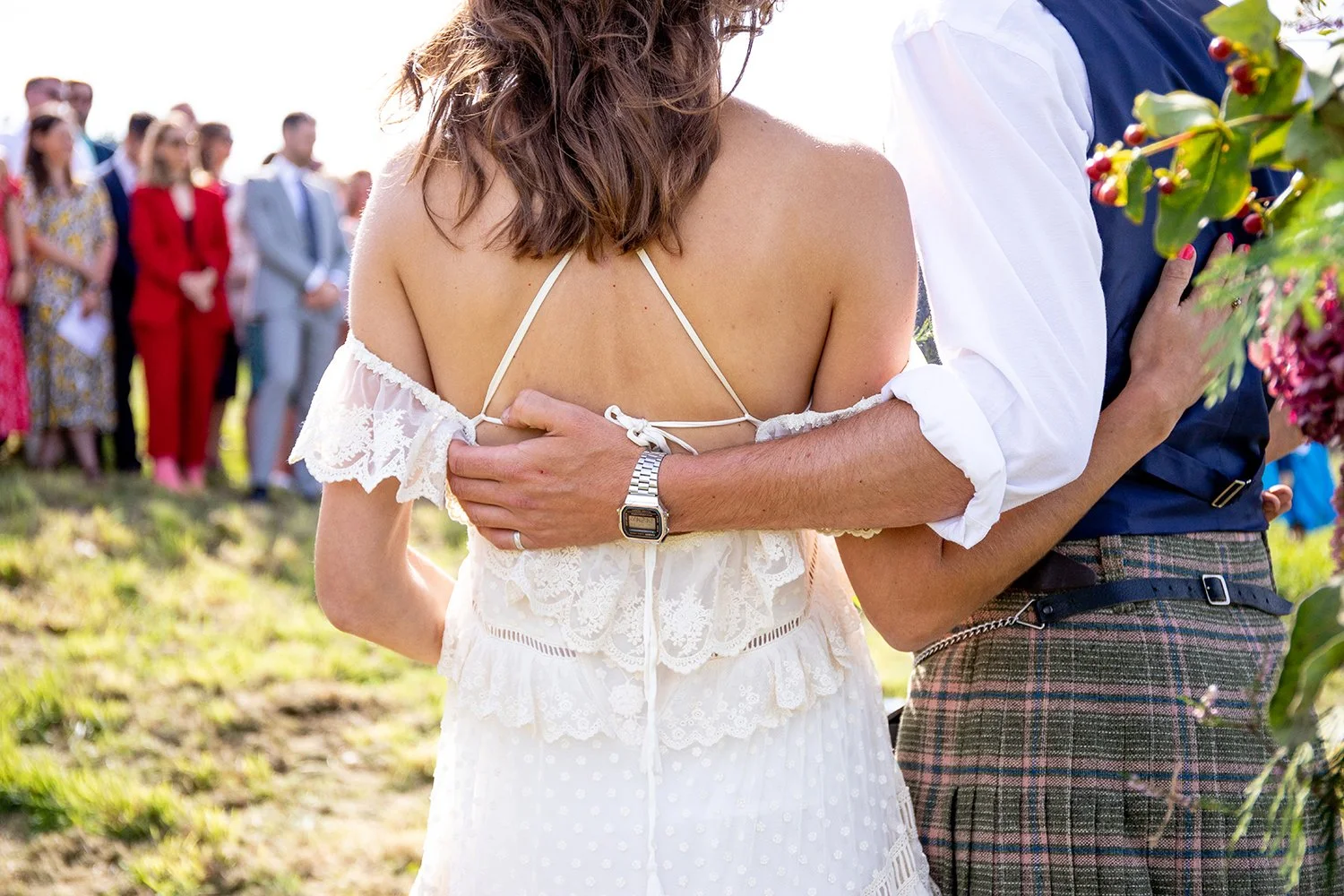bride and groom holding each other