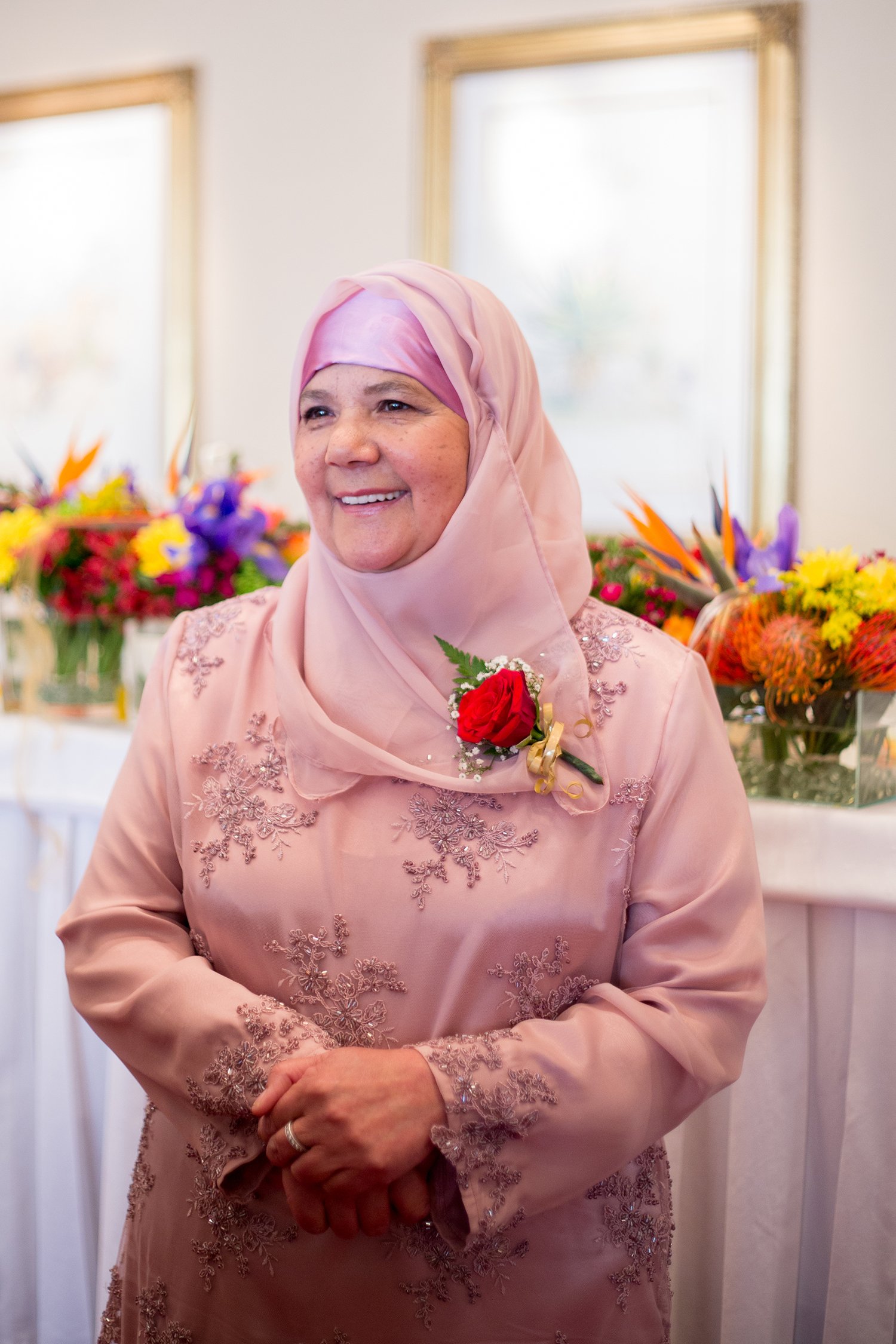 indian mother of bride laughing at Hindu wedding