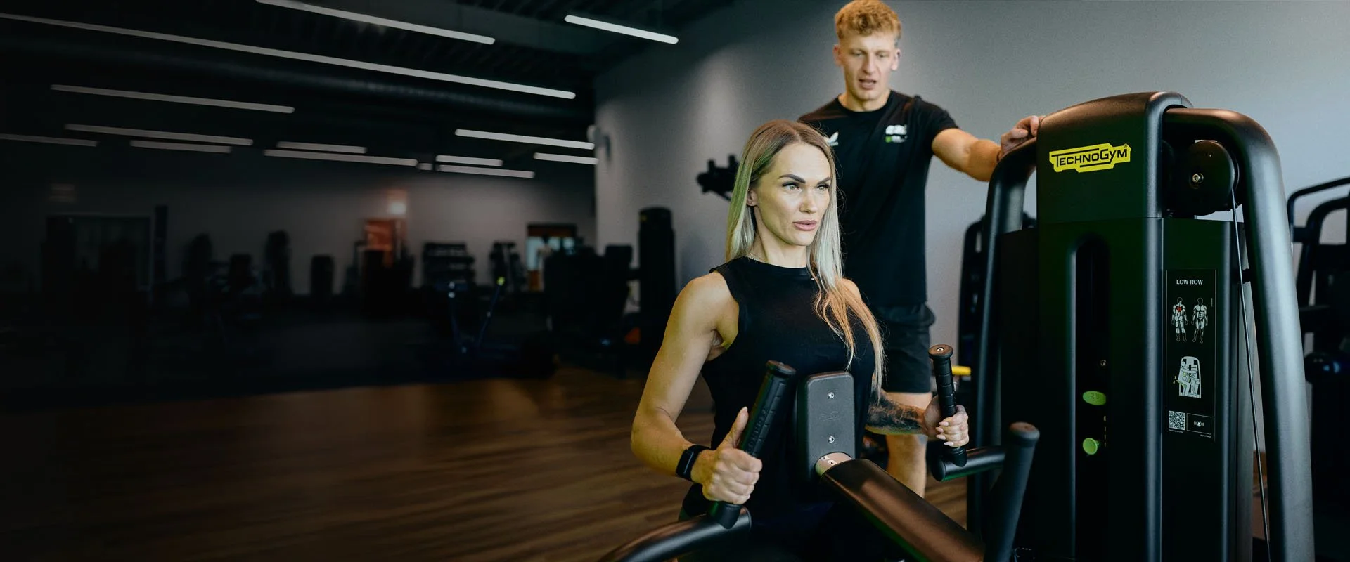 Personal trainer with a CPD specialisation in a session with a client