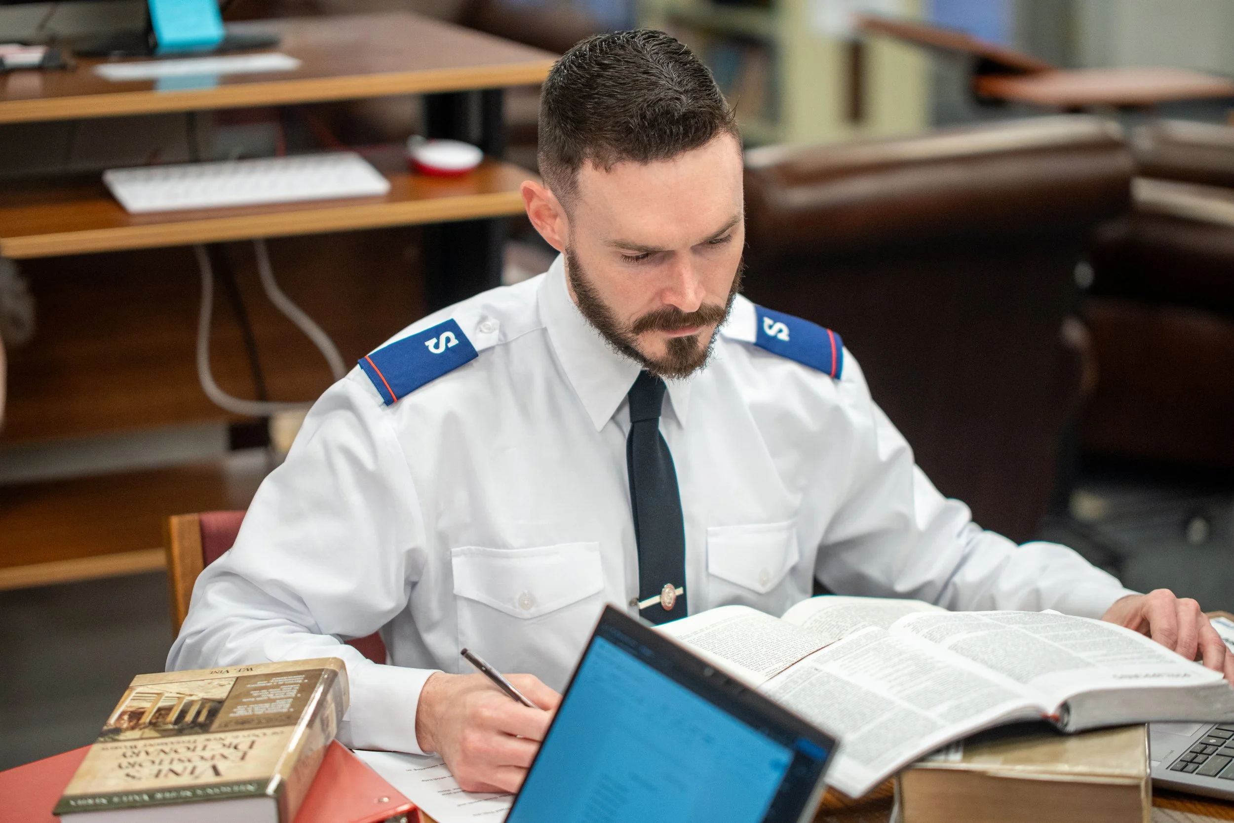 Officer studying the Bible