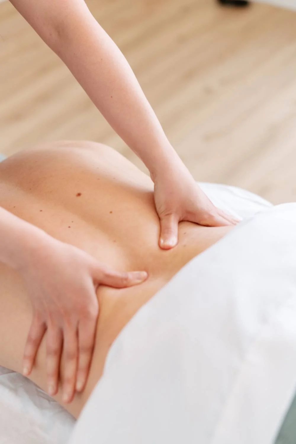 Professional massage therapy treatment at The Wellness Hub in Stoney Creek clinic