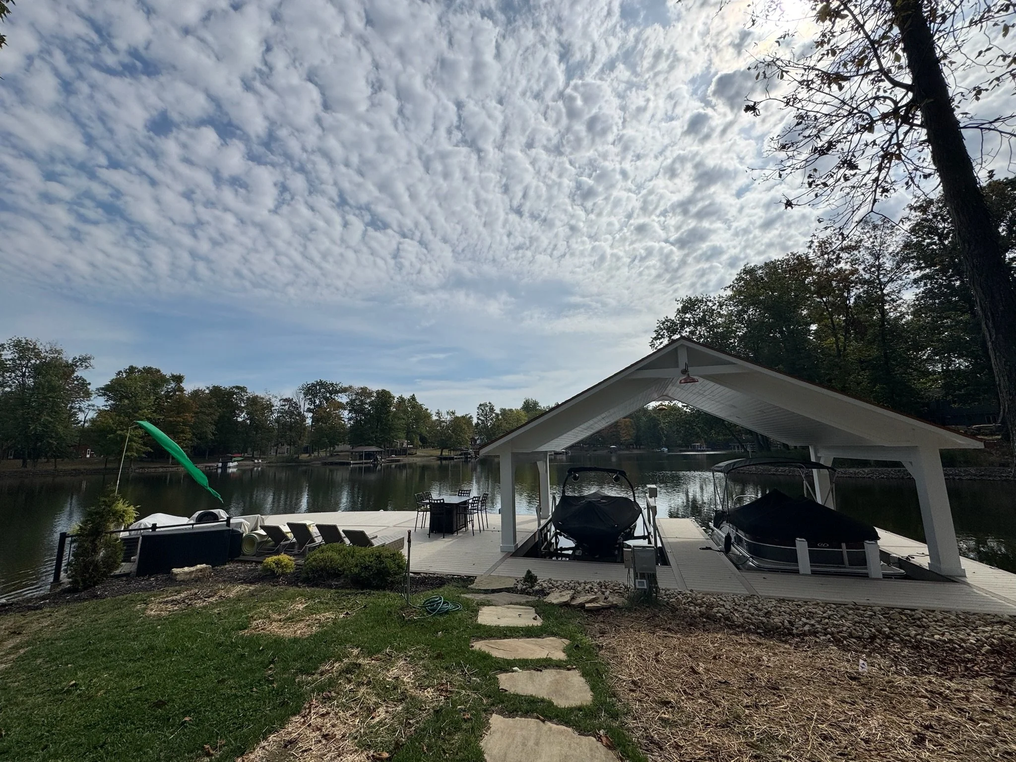 Vaulted boathouse with dock and composite decking